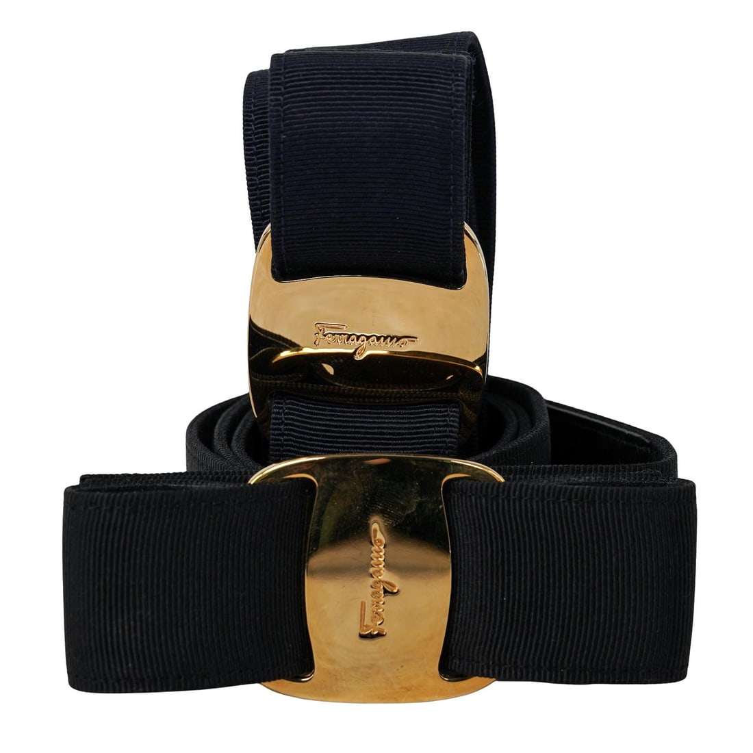 (2 Pc) Salvatore Ferragamo Vara Bow Belts: (2 Pc) Salvatore Ferragamo Vara Bow Belts 20th century, Italian (2 Pc) Salvatore Ferragamo Vara Bow Belts in black and navy blue with gold-tone buckles. The belts made of grosgrain fabric and