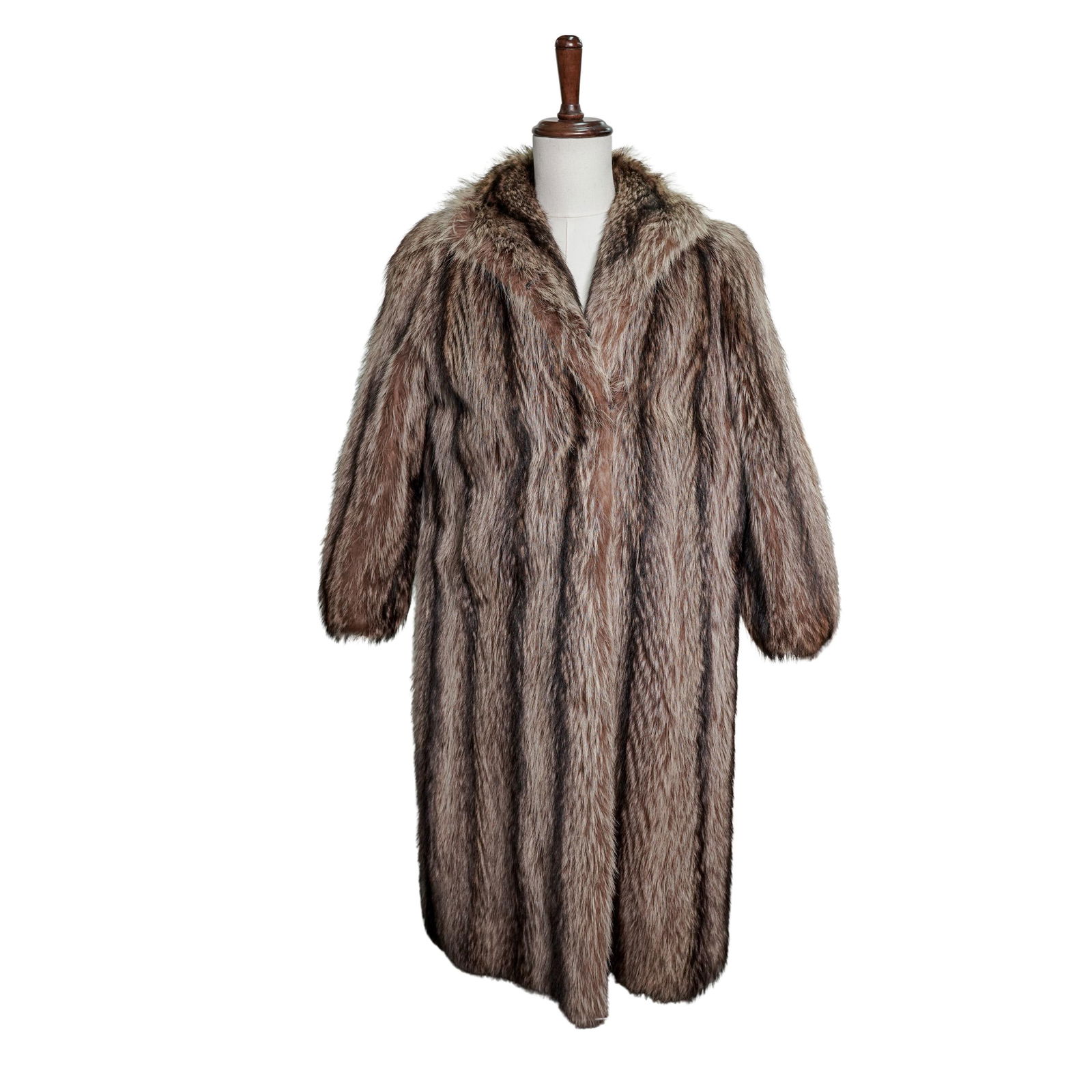 Vintage Fur Long Coat: Vintage Fur Long Coat Early to Mid 20th Cent., USA The coat features a light beige base with brown streaks running vertically throughout. It has a generous cut, a plush shawl collar, long sleeves,