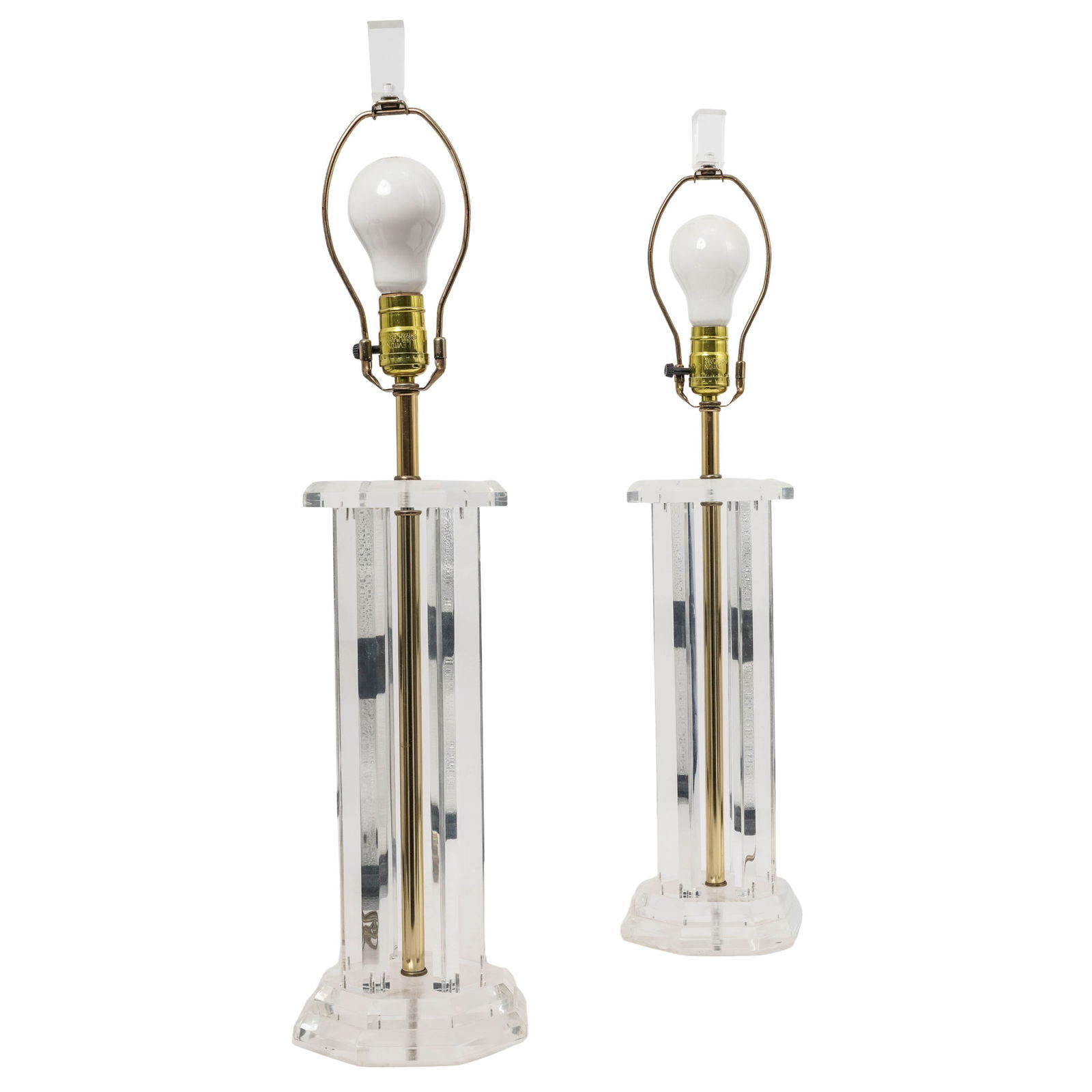 Pair of MCM Lucite Lamps: Pair of MCM Lucite Lamps Mid 20th century A pair of mid-century modern lucite table lamps. H 28" x Diameter base 5.5"