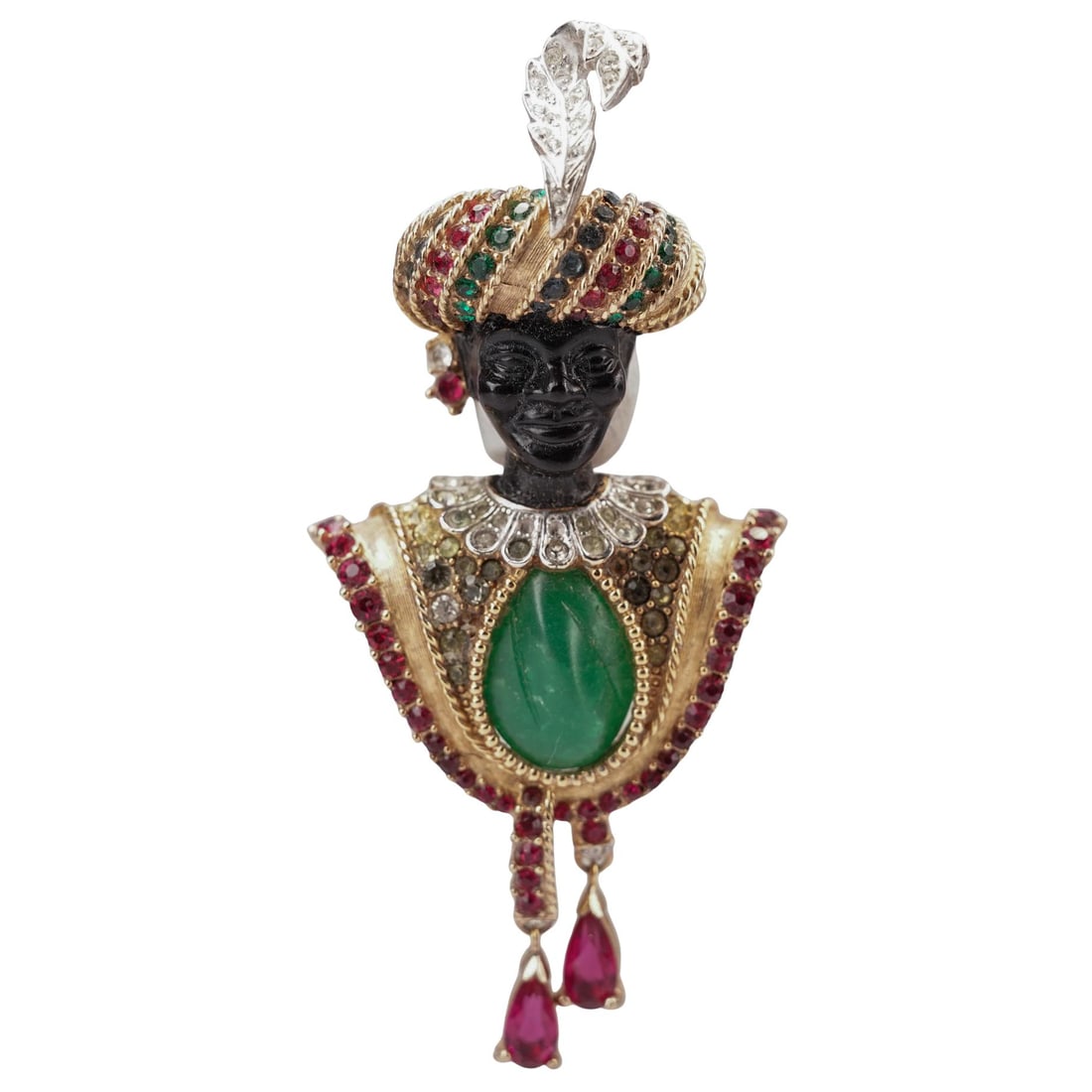 Vintage Boucher Blackamoor Brooch: Vintage Boucher Blackamoor BroochEarly 20th century, FrenchVintage Boucher blackamoor brooch, gilt metal construction with enamel painted detail. Large green stone inset with rhinestone inset adornmen