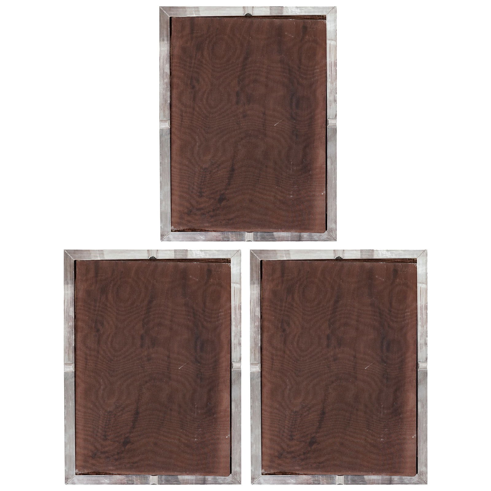 (3 pcs) Silver Plated Photo Frames: (3 pcs) Silver Plated Photo Frames20th centuryA set of three silver plated photo frames.H 13.25" x W 10.25"