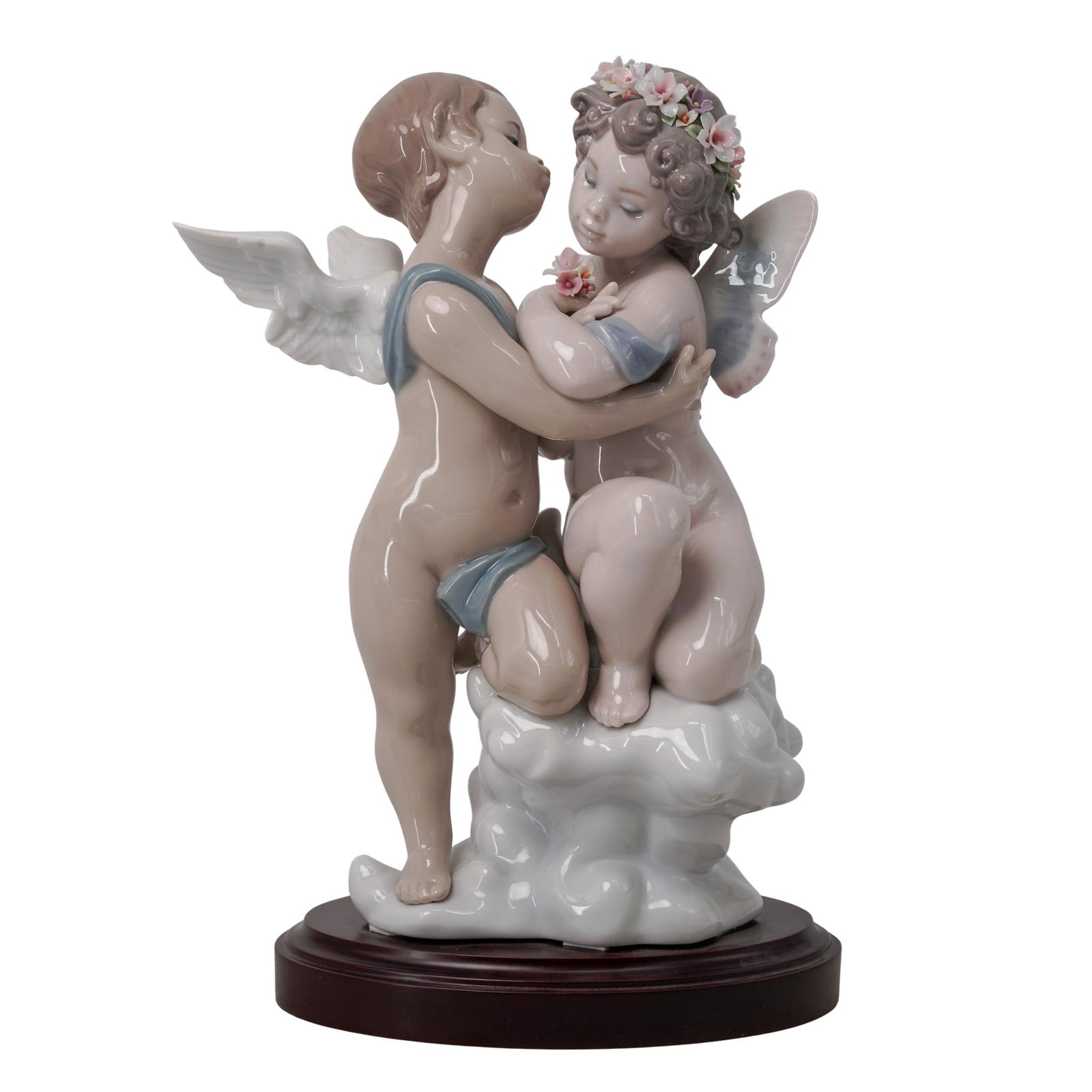 Lladro "Heaven & Earth" Porcelain Figurine: Lladro "Heaven & Earth" Porcelain Figurine1998-1999, SpainLladro "Heaven & Earth" (model 1824) porcelain figurine, manufactured 1998 and discontinued in 1999. Wooden base.H 11.5" x L 8.25" x W 5.5" Ba