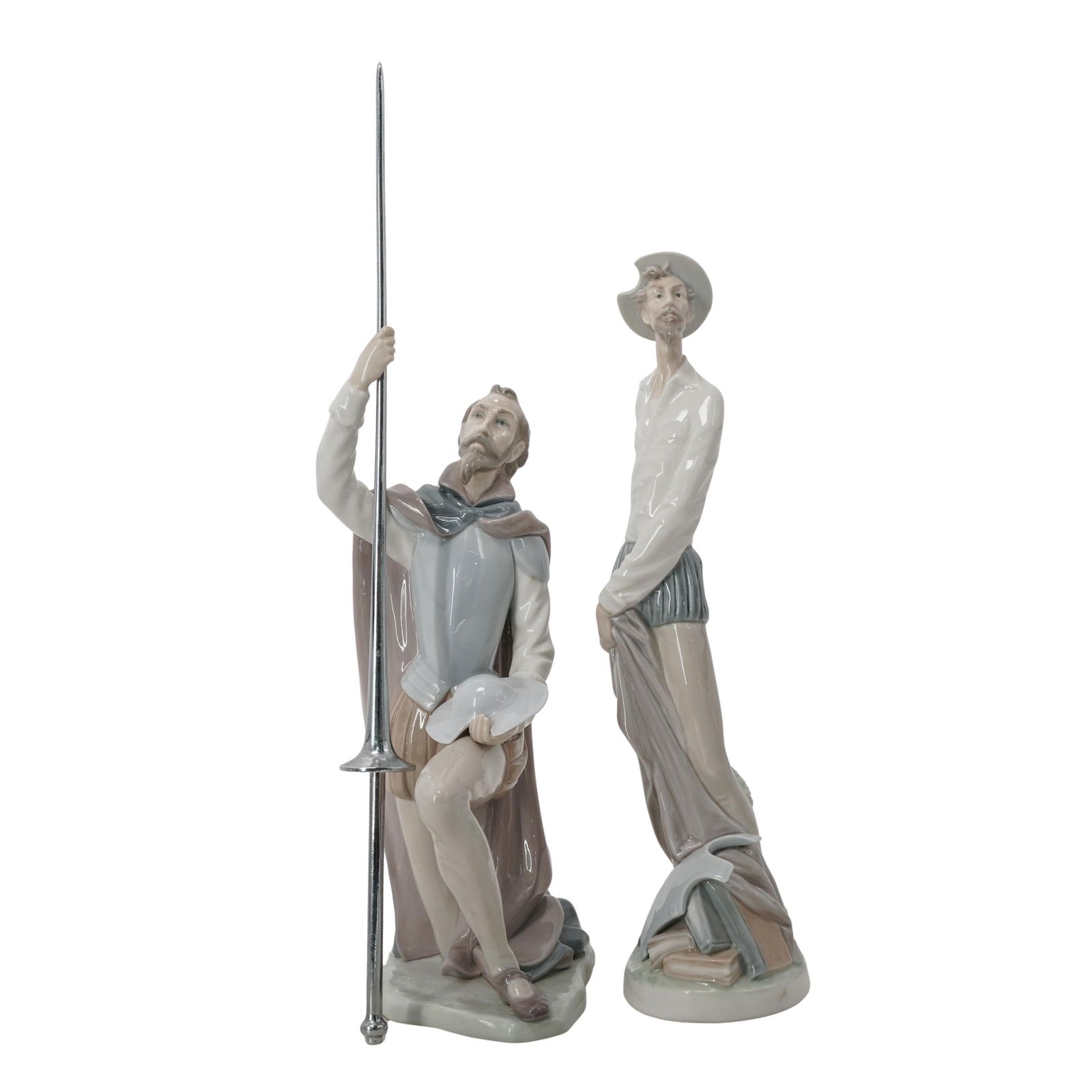 (2 Pc) Lladro Don Quixote Porcelain Figurines: (2 Pc) Lladro Don Quixote Porcelain Figurines20th century, SpanishLot includes:(1) Don Quixote kneeling , model # 5224, issued 1984, retired 1998, designed by Salvador Furio(1) Don Quixote standing up