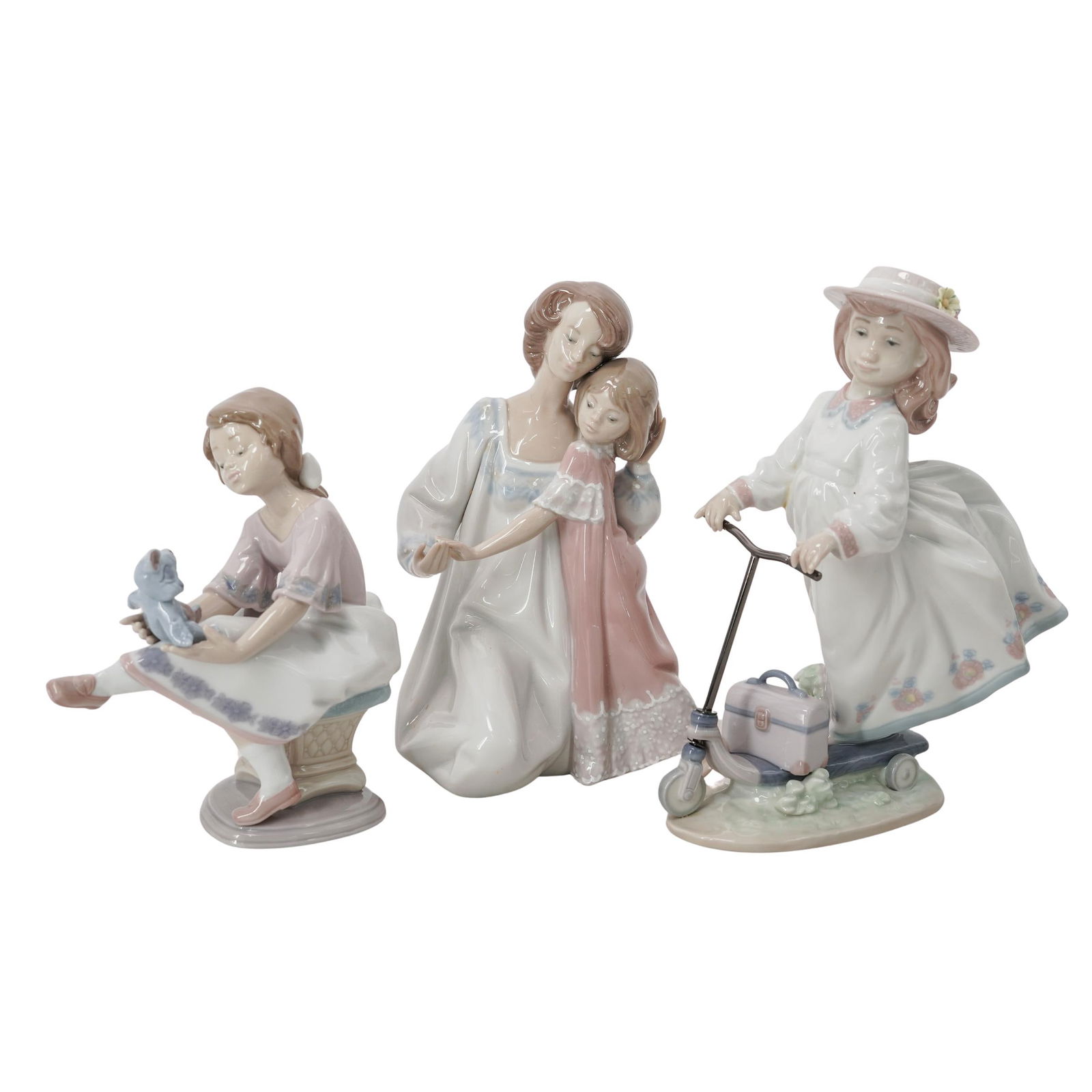 (3 pc) Lladro Porcelain Figurines: (3 pc) Lladro Porcelain Figurines 20th century, Spanish Lot Includes: 1) "Good Night" # 5449 Issued 1987, retired 2007 , Sculptor Juan Huerta. 1) "On The Go" # 6031 Issued 1993, retired 1995,