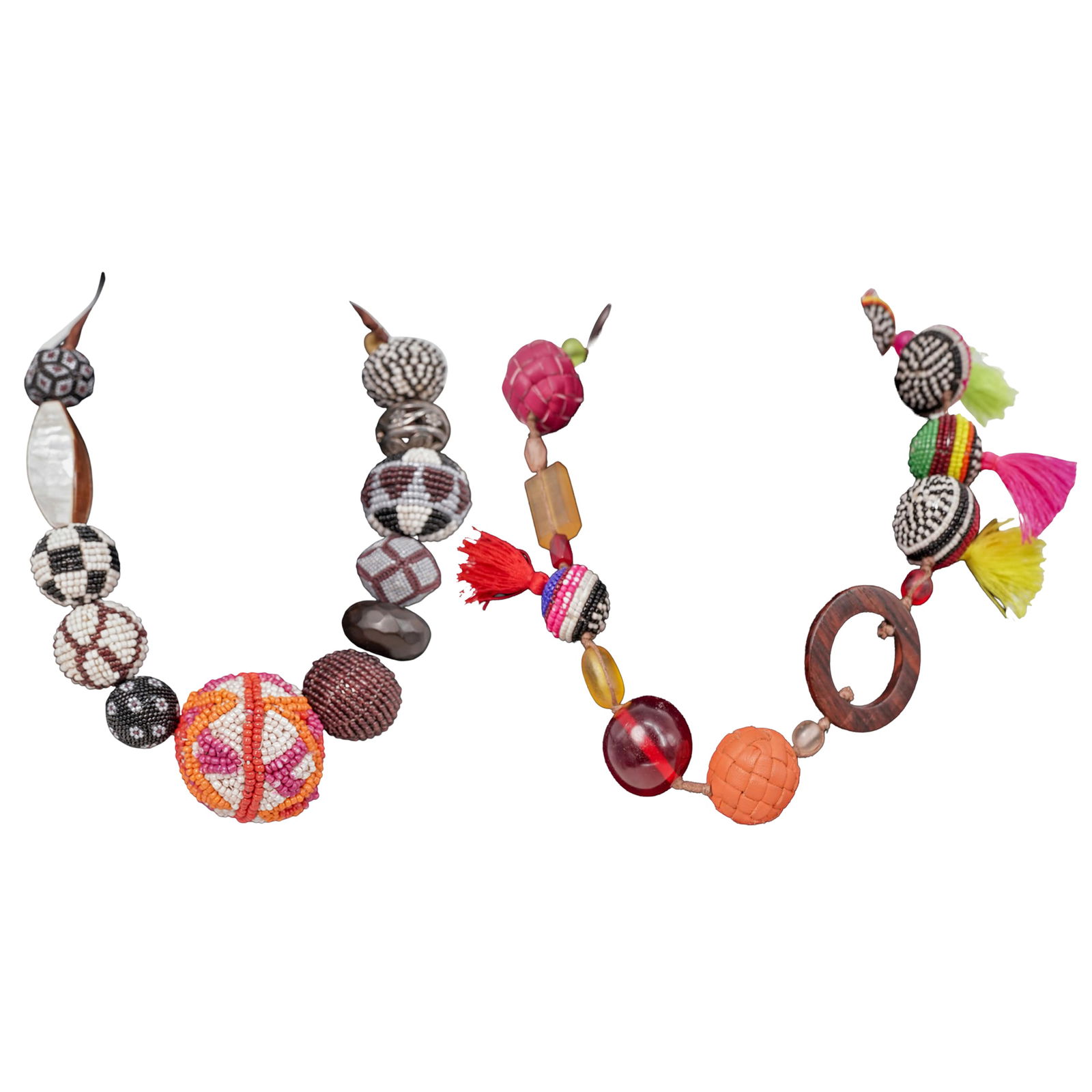 (2 pcs) Maliparmi Indonesian Hand Beaded Necklaces: (2 pcs) Maliparmi Indonesian Hand Beaded Necklaces20th century, IndonesiaA set of two hand beaded necklaces with frosted glass and mother of pearl accents. Each marked near clasp with plaque engraved