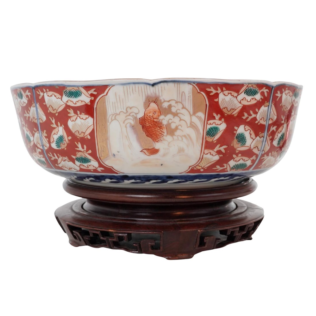 19th Cent. Japanese Imari Porcelain Bowl: 19th Cent. Japanese Imari Porcelain BowlMid to late 19th century, JapaneseA 19th century Japanese Imari porcelain bowl featuring bright red and gilt accented traditional Japanese motifs including koi