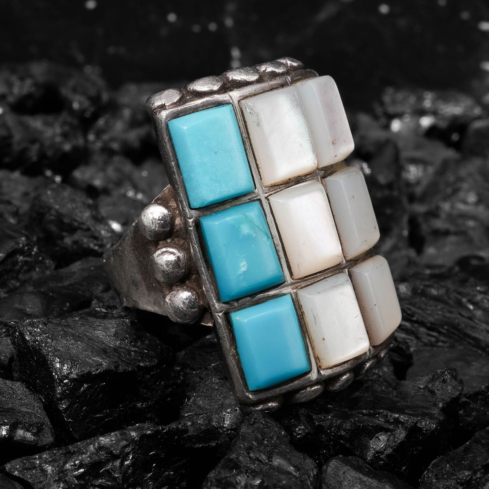 Vintage Zuni Sterling Silver Turquoise & MOP Ring: Vintage Zuni Sterling Silver Turquoise & MOP RingCirca 1970s-1980s, USAVintage Zuni sterling silver ring set with a rectangular mosaic inlay panel composed of turquoise and mother-of-pearl square tile