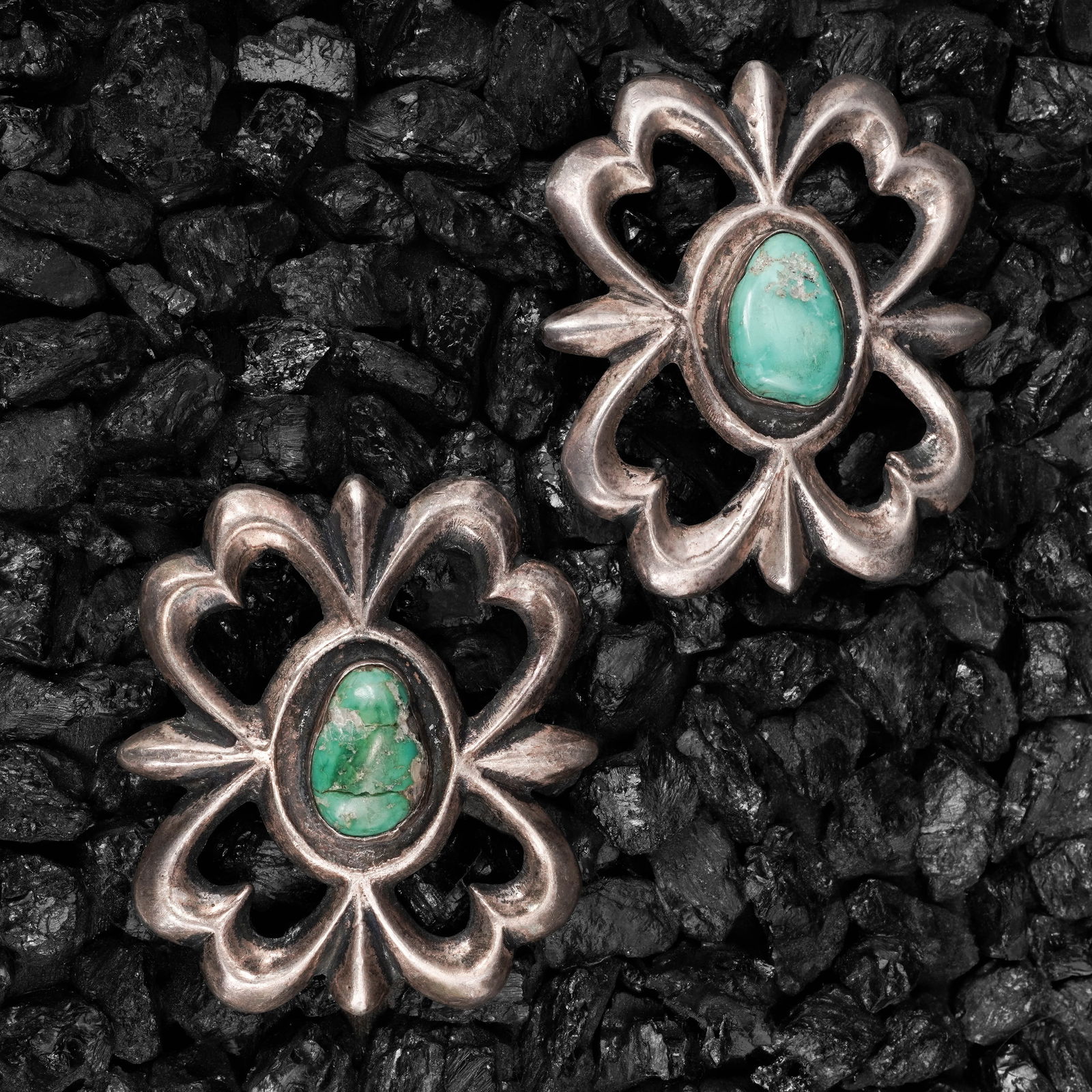 (2 Pcs) Vintage Navajo Sterling Silver & Turquoise Belt Buckles: (2 Pcs) Vintage Navajo Sterling Silver & Turquoise Belt BucklesCirca 1970s-1980s, USAPair of vintage Navajo silver belt buckle plates formed as matched quatrefoil panels with pierced clover-style cuto