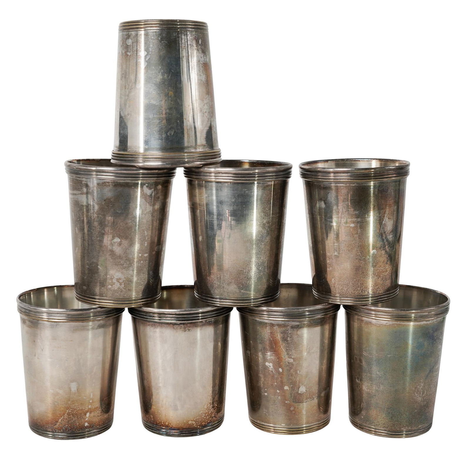 (8 pcs) De Uberti Italian Silver Plated Julip Tumblers: (8 pcs) De Uberti Italian Silver Plated Julip Tumblers20th century, ItalianA set of eight KI De Uberti Italian silver plated Julip tumblers. Marked on bottom "KI De Uberti Italy".H 3.75" x Diameter 3"