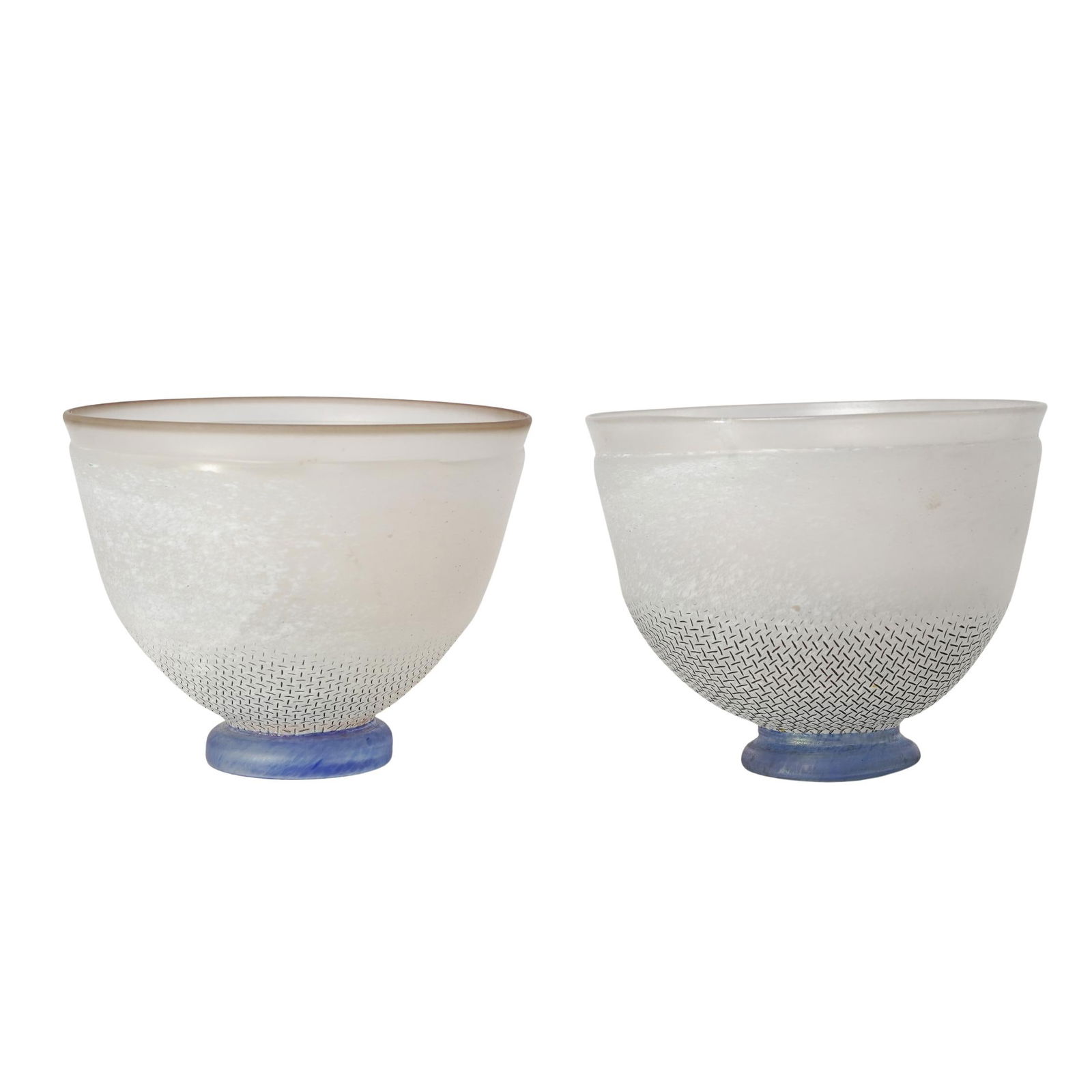 Pair of Kosta Boda x Bertil Vallien "Network" Glass Bowls: Pair of Kosta Boda x Bertil Vallien "Network" Glass Bowls20th century, SwedenA pair of Kosta Boda glass bowls designed by Bertil Vallien in the "Network" pattern. Marked on bottom "Boda B Vallien" "57