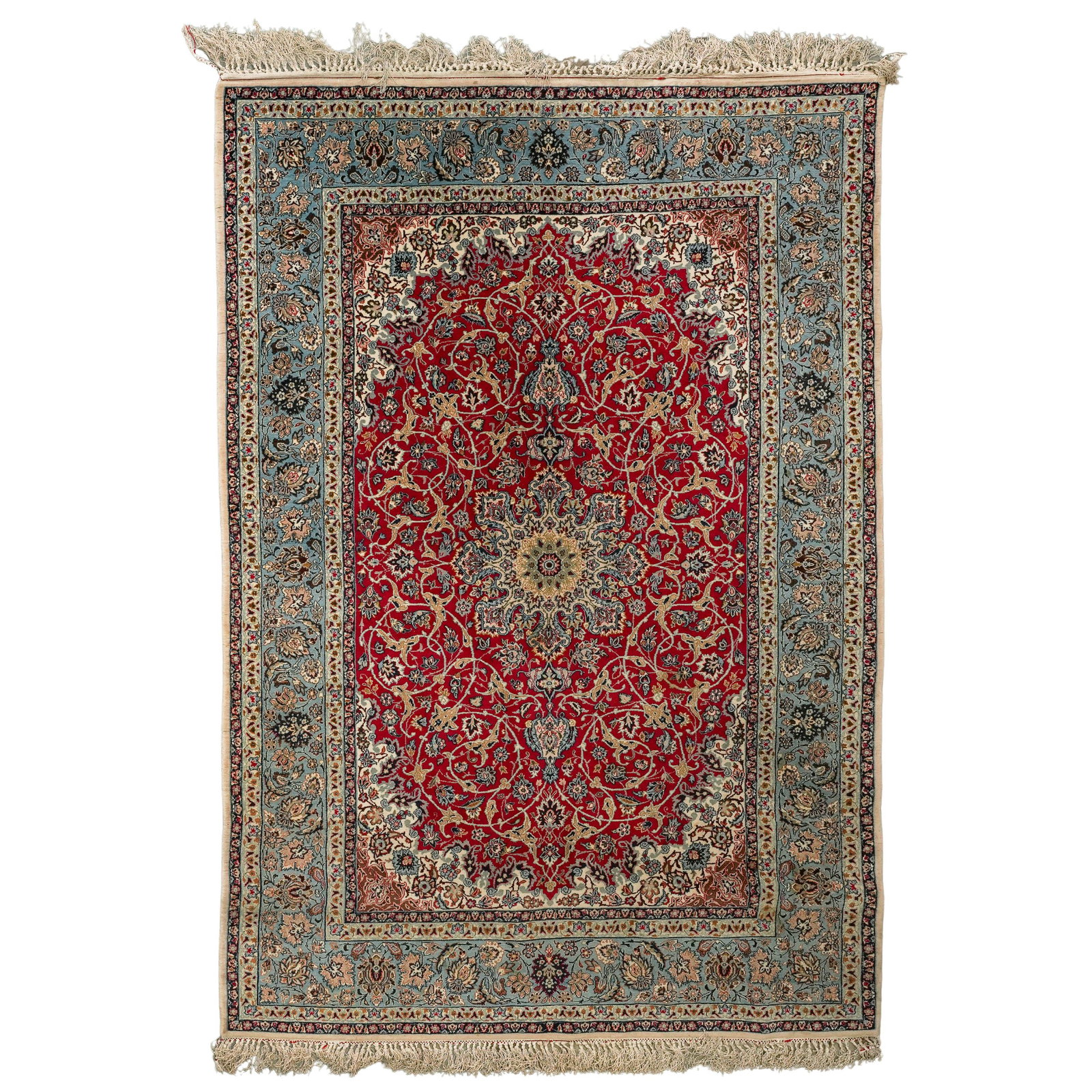 Persian Isfahan Wool & Silk Rug: Persian Isfahan Wool & Silk Rug Mid-20th Century, Iran Vintage Persian Isfahan area rug featuring a vibrant red field with an elaborate floral medallion, light blue border, and intricate scrolling flo