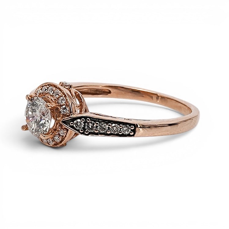 14k Gold & Diamond Halo Engagement Ring: 14k Gold & Diamond Halo Engagement Ring 2020s, USA 14k rose gold diamond engagement ring with round brilliant cut center diamond weighing approx. 0.50 carats, I color and I1 clarity, framed by round b