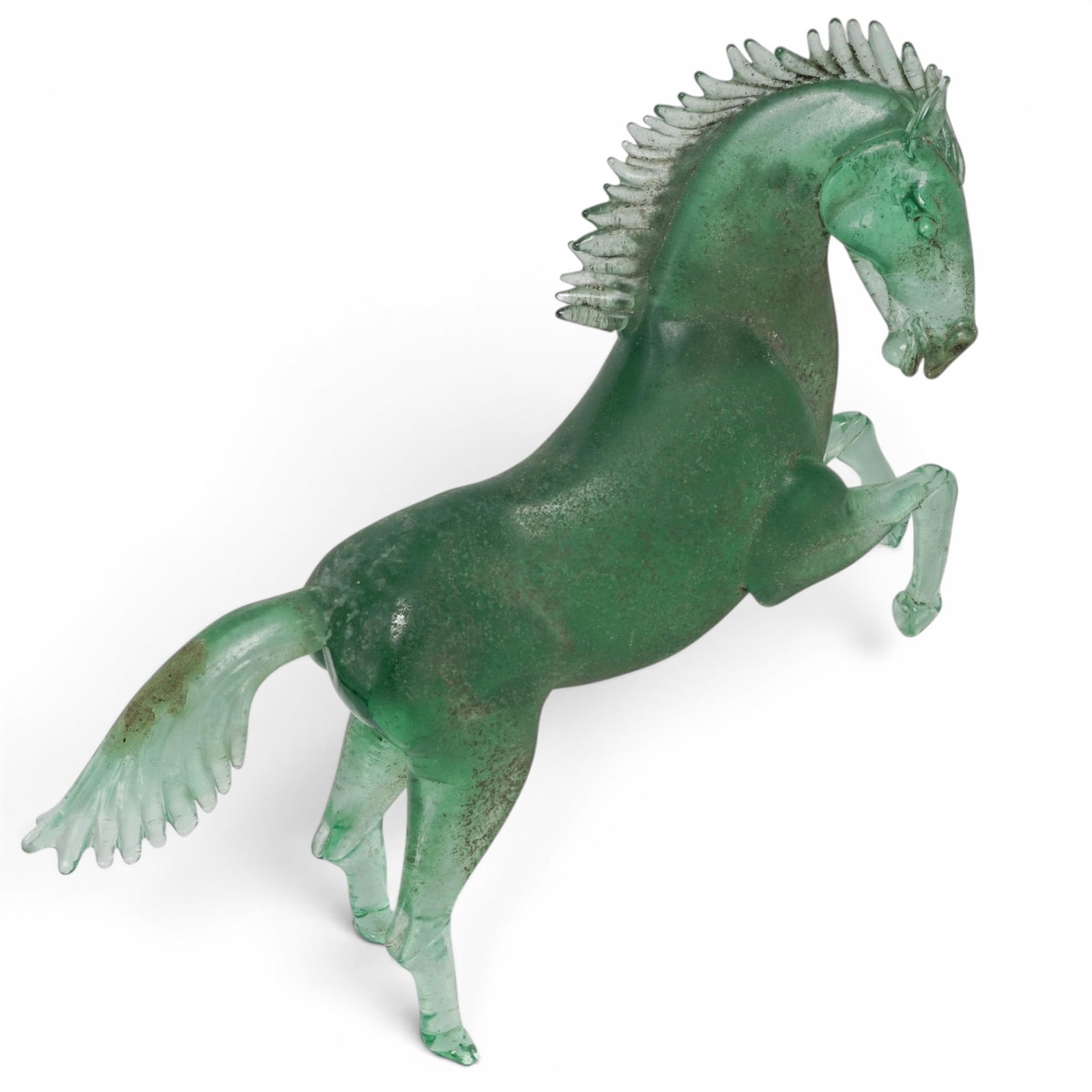 Pino Signoretto Murano Glass Rearing Horse Sculpture: Pino Signoretto Murano Glass Rearing Horse Sculpture Circa 1980. Italian A Pino Signoretto Murano glass rearing horse sculpture crafted from green glass, featuring a textured "Scavo" technique to simu