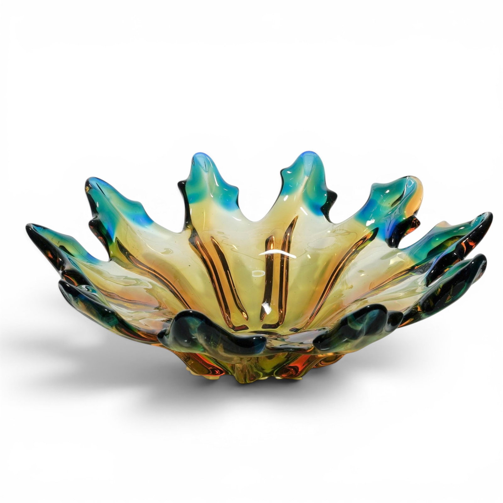 Murano Glass Freeform Bowl: Murano Glass Freeform Bowl Mid-20th Century, Italy Freeform Murano art glass bowl featuring a dramatic organic form with ruffled edges and a combination of amber-yellow, cobalt blue, and emerald green