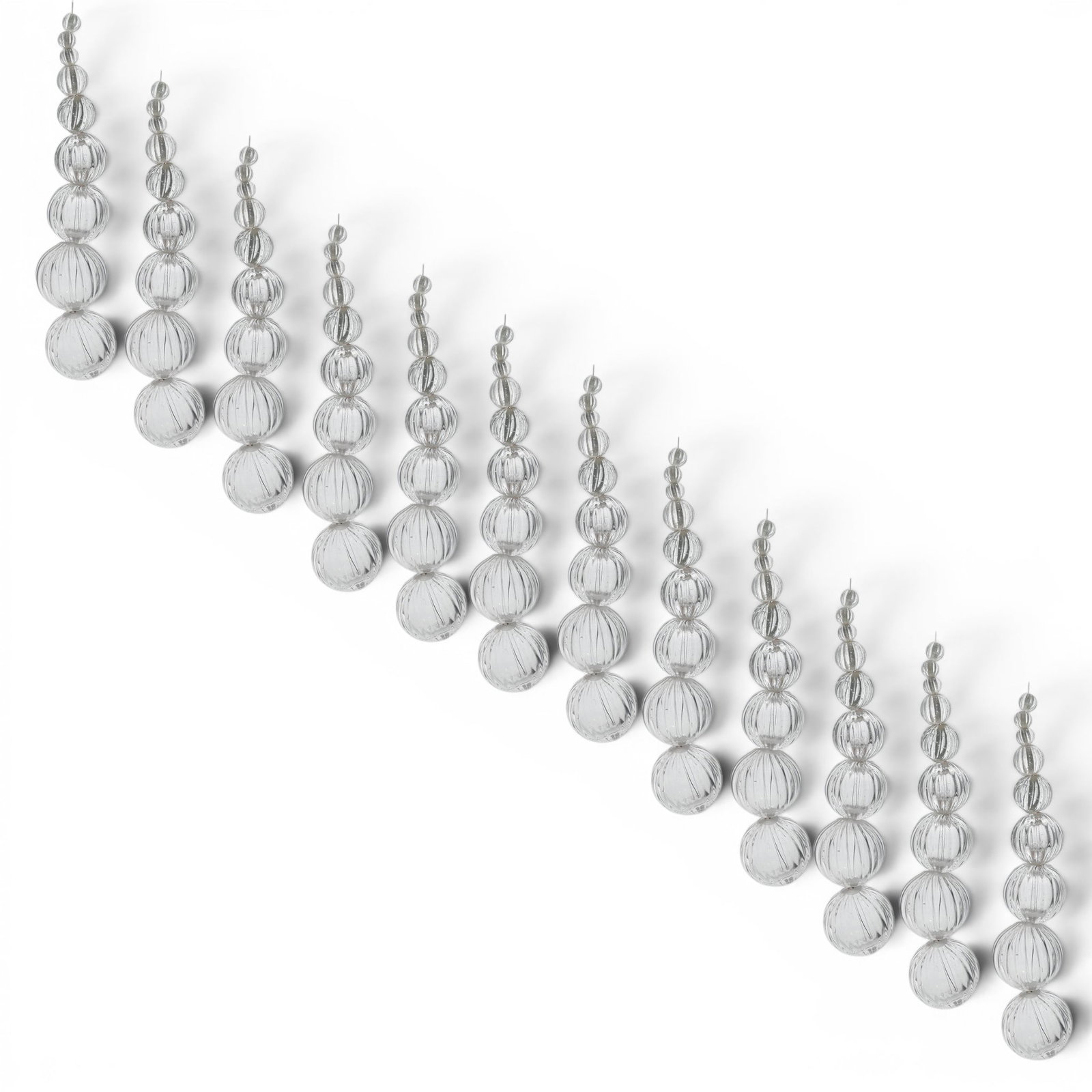 (12 pc) Vintage Murano Glass Clear Spherical Beads Prisms: (12 pc) Vintage Murano Glass Clear Spherical Beads Prisms 20th century, Italian The beads are spherical and have a textured ribbed design. All the strands are made in a graduated sequence, tapering fr