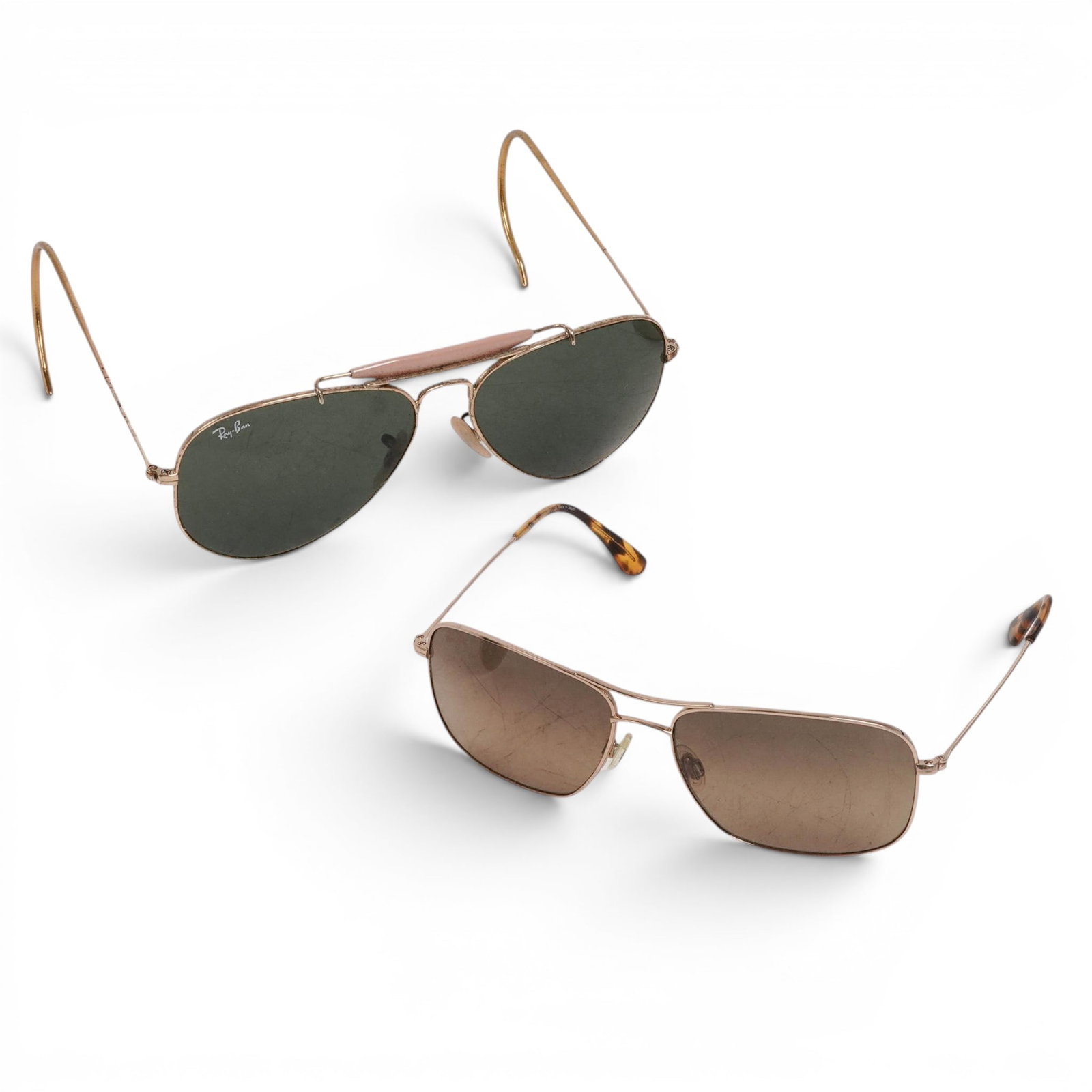 (2 pc) Vintage Ray-Ban "Outdoorsman" & "Maui" Sunglasses: (2 pc) Vintage Ray-Ban "Outdoorsman" & "Maui" Sunglasses c. 1990s, USA, Japan There lot includes: (1) Classic Ray-Ban Outdoorsman model, the text on a gold wire reads "Outdoorsman L0216 58 [ ] 14 150 