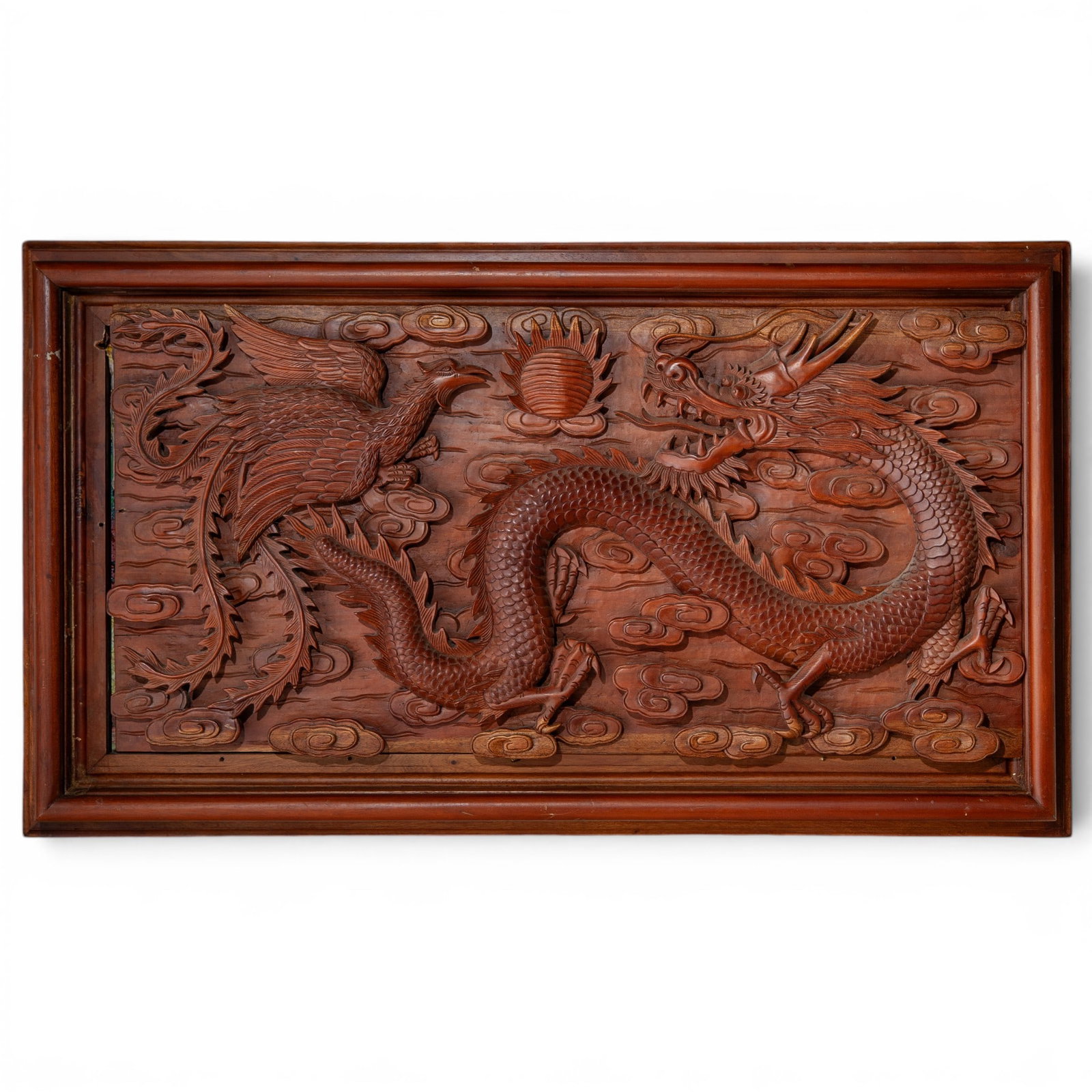 East Asian Dragon & Phoenix Hand Carved Wood Relief: East Asian Dragon & Phoenix Hand Carved Wood Relief 20th century, East Asian This is a highly detailed, hand-carved relief wood carving depicting the traditional East Asian motif of the Dragon and Pho