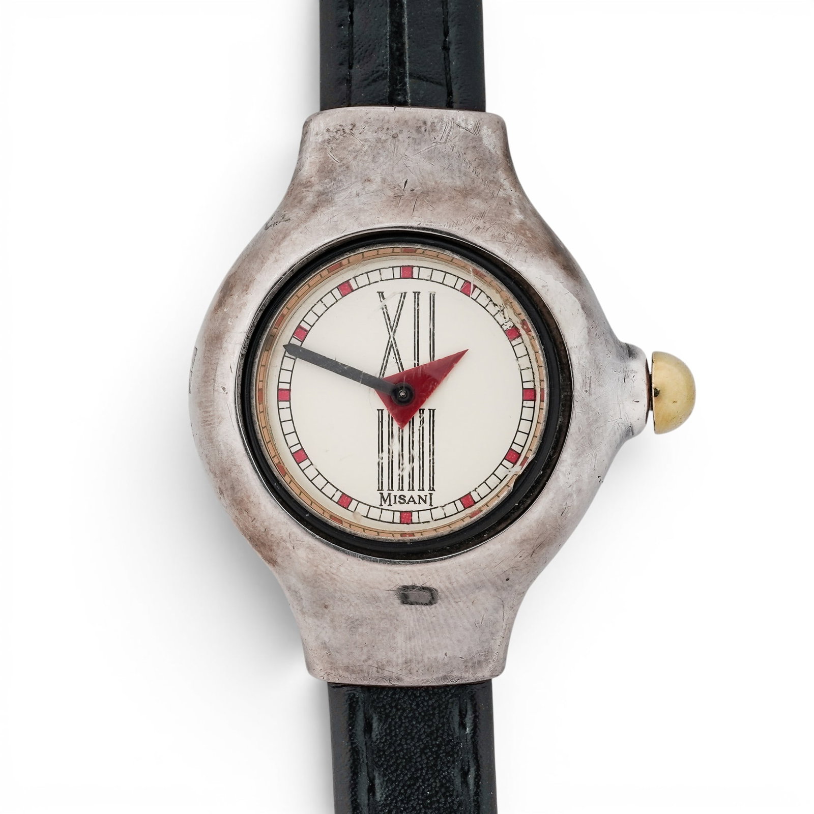 Misani Cadillac Sterling Silver Watch: Misani Cadillac Sterling Silver Watch 1990s, Italian/Swiss Sterling silver Misani Cadillac wristwatch with sculptural rounded case, bubble crystal, cream Roman numeral dial, red triangular center