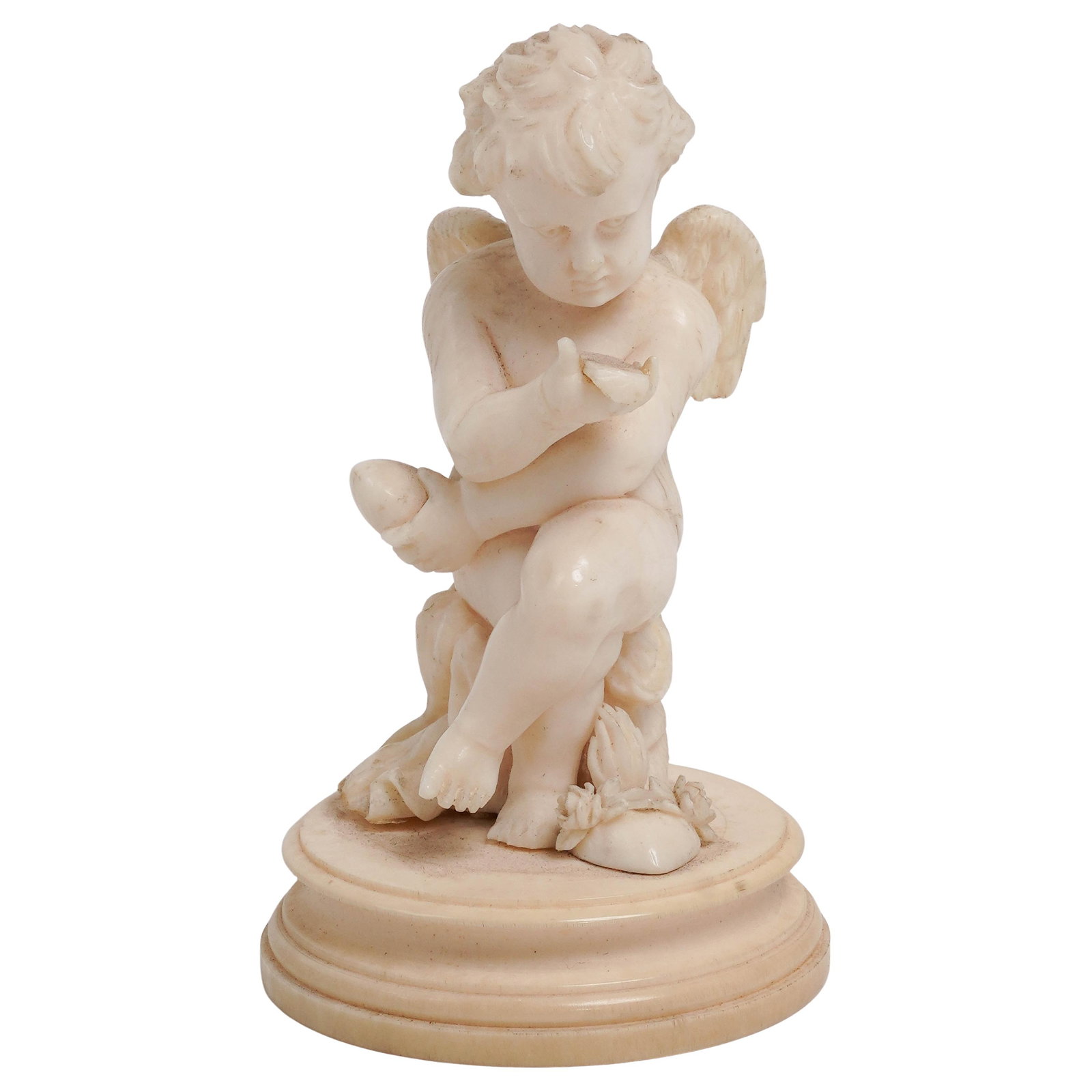 Gerruder Kauzmann Workshop German Carved Bone Cherub Figure: Gerruder Kauzmann Workshop German Carved Bone Cherub Figure c. 1891-1910, Germany Gebrüder Kauzmann cherub figure carved from bone, they maintained a highly specialized luxury division that utilized 