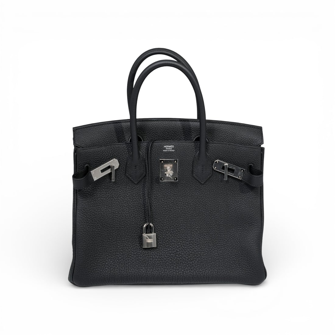 Hermes Birkin 30 Leather Handbag: Hermes Birkin 30 Leather Handbag21st Cent, FrenchHermes Birkin 30 leather handbag. Crafted in black leather. Featuring palladium hardware. Retains keys, clochette and clochette dustbag. Centered above