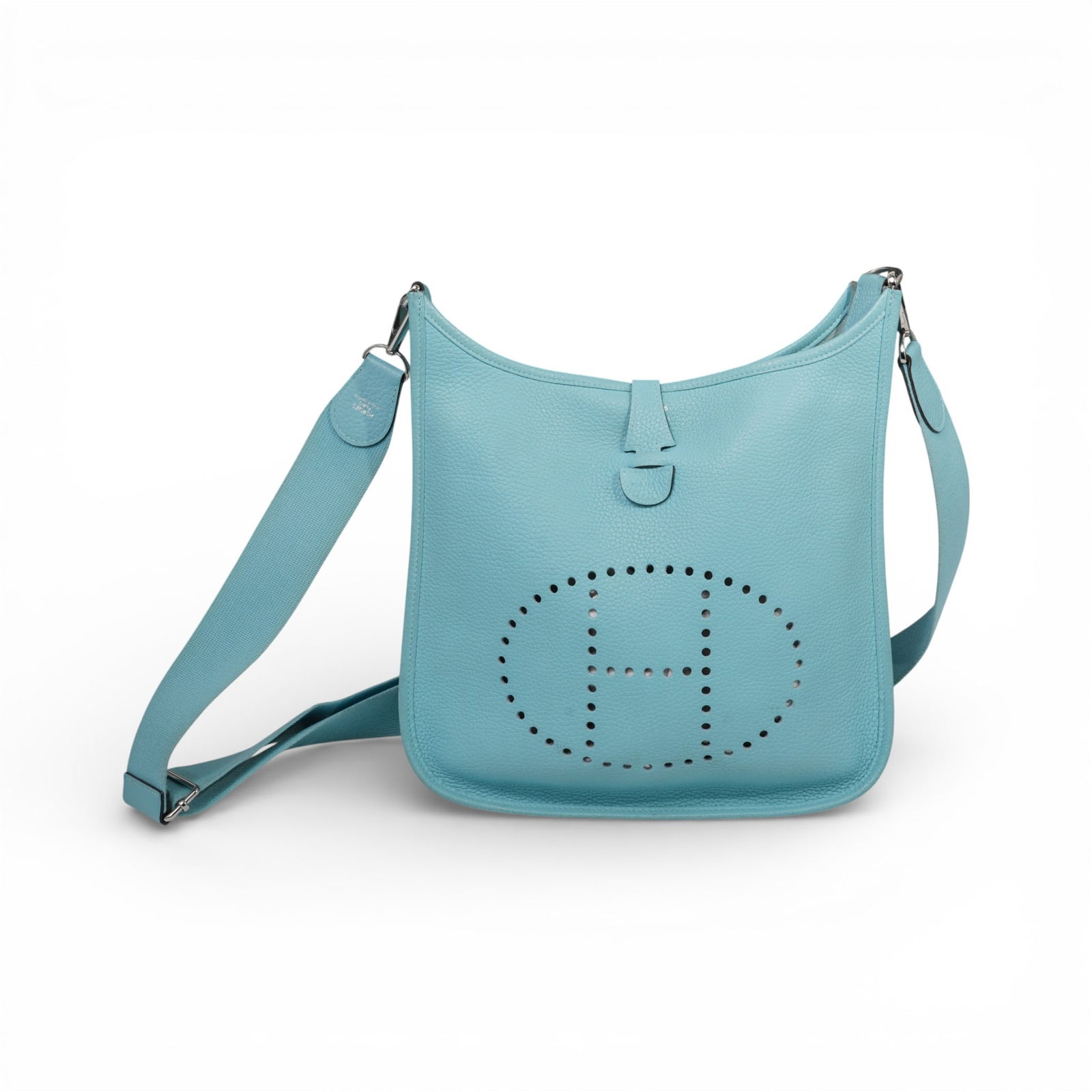 Hermes Evelyne III Leather Croosbody Bag: Hermes Evelyne III Leather Croosbody Bag21st Cent., FrenchEvelyne Gen III leather croosbody bag featuring an adjustable strap and a back pocket. Crafted from Clemence leather in a pale, light blue col