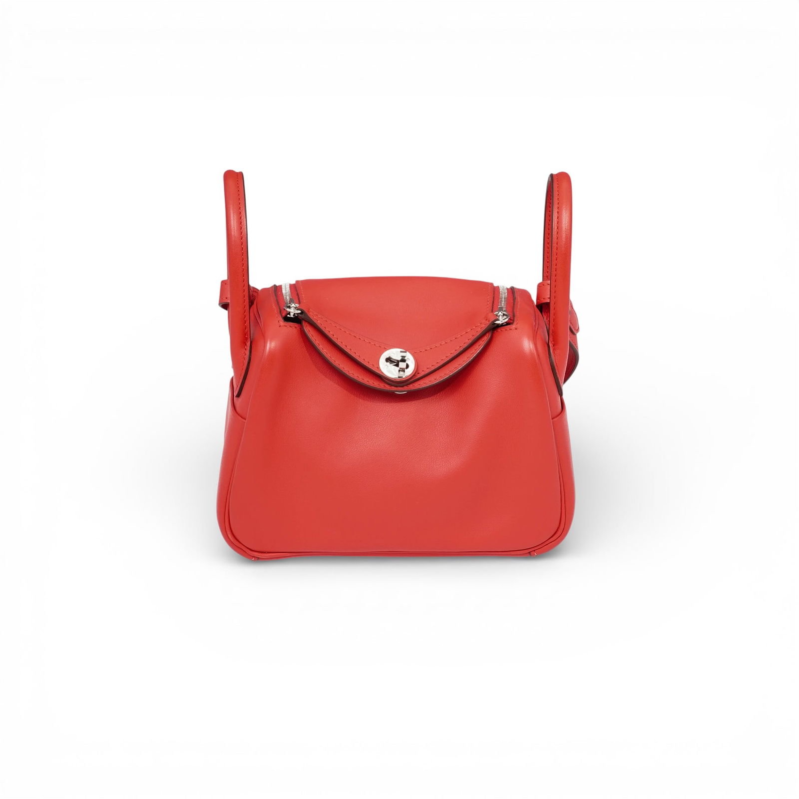 Hermes Lindy Mini "Rouge de Coeur"Leather Crossbody Bag: Hermes Lindy Mini "Rouge de Coeur"Leather Crossbody Bag2021, FrenchHermes Mini Lindy crossbody a luxury bag featuring an intense red swift leather known as Rouge de Coeur by the brand and palladium si