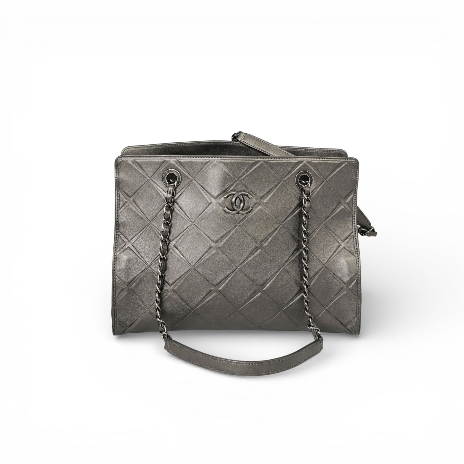 Chanel CC Hobo Metallic Leather Bag: Chanel CC Hobo Metallic Leather Bag21st Cent., FrenchChanel CC Hobo metallic leather bag crafted of quilted gray leather with a leather-woven chain strap and the signature interlocked CC logo. The bag
