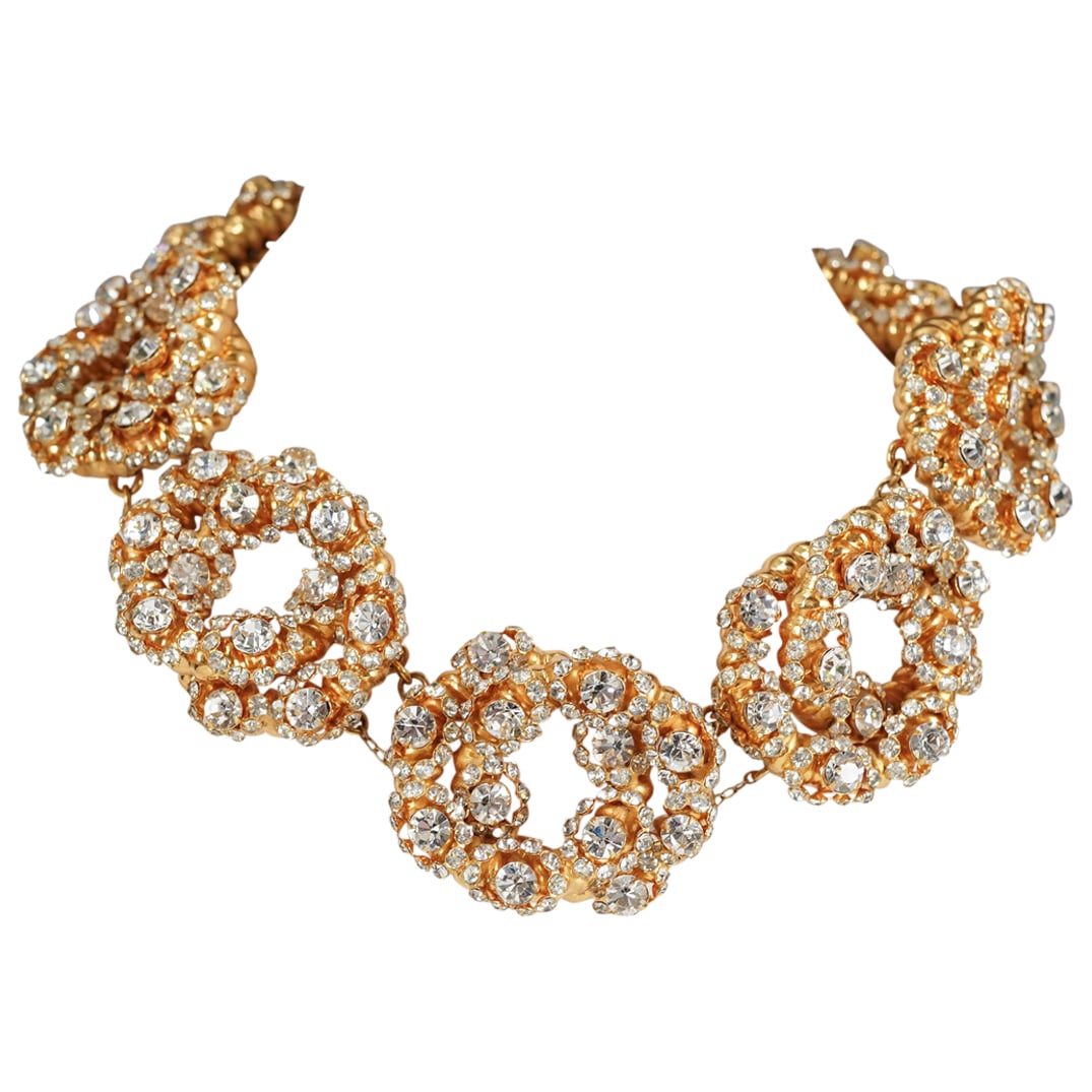 Chanel 1984 Masterpiece Runway Necklace: Chanel 1984 Masterpiece Runway Necklace1980s, FranceChanel 1984 Masterpiece Runway Necklace. In gold tone metal, with eight linked chunk gold tone pieces resembling a pair of linked circles, in gold t