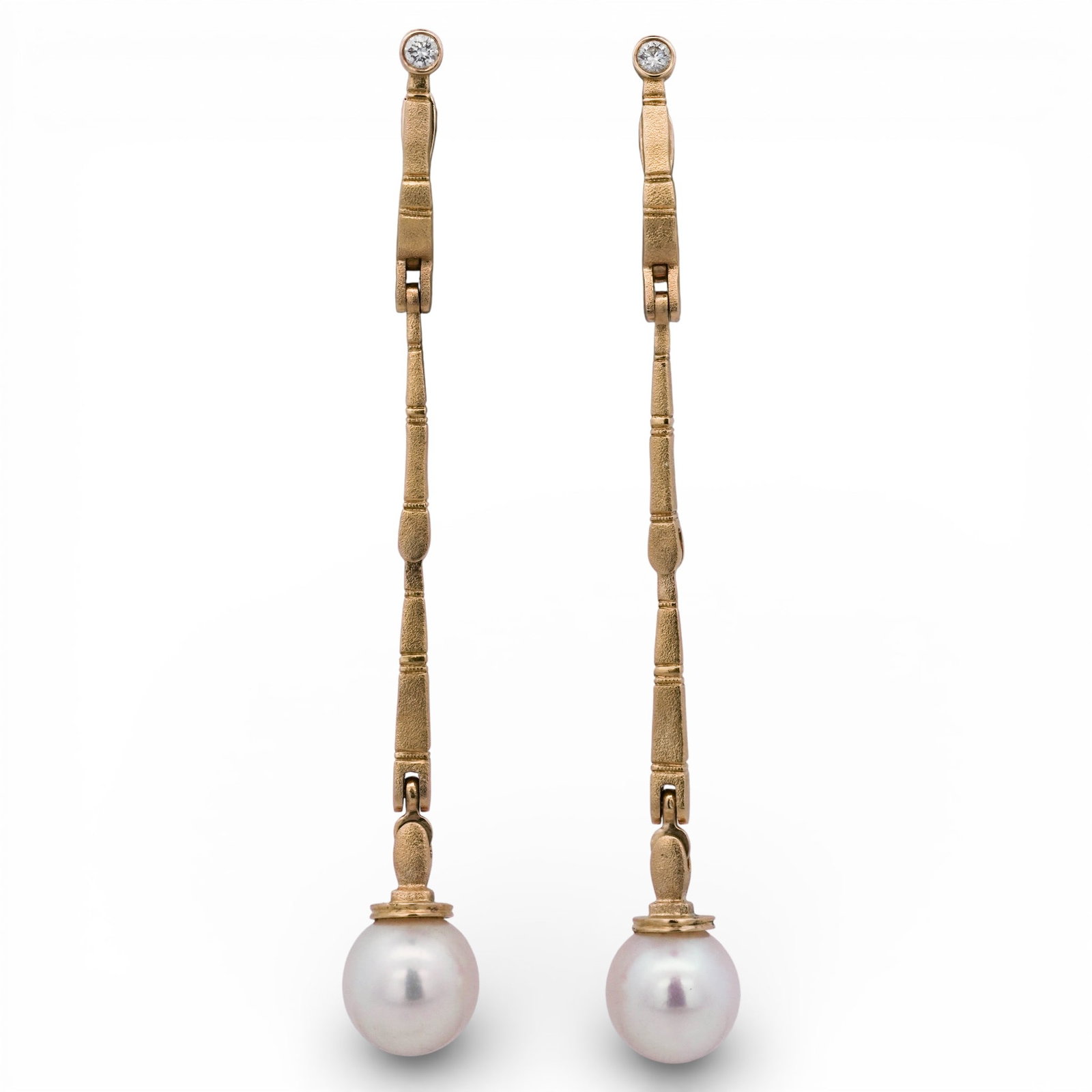 Alex Sepkus 18k Gold Diamond & Pearl Drop Earrings: Alex Sepkus 18k Gold Diamond & Pearl Drop EarringsCirca Late 20th Century , USA18k yellow gold articulated drop earrings by Alex Sepkus, executed in the maker’s signature matte, hand-textured finish