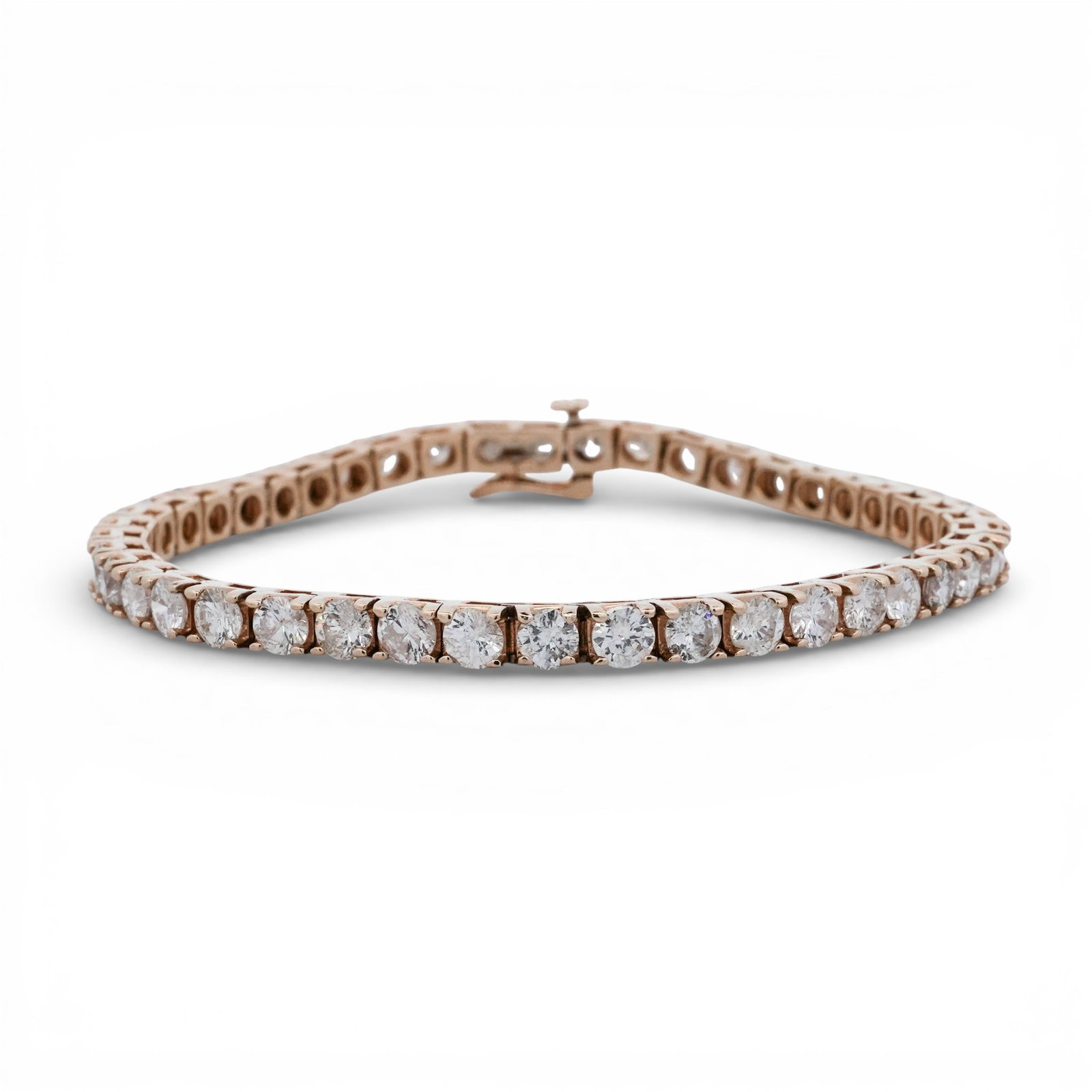14k Gold & Diamond Tennis Bracelet: 14k Gold & Diamond Tennis BraceletLate 20th centuryTennis bracelet in 14K yellow gold, set throughout with a continuous single row of 44 round brilliant-cut diamonds averaging approximately 3.5 mm, ea