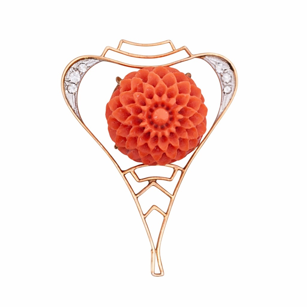 14k Gold Diamond & Carved Coral Pendant: 14k Gold Diamond & Carved Coral PendantCirca Late 20th Century14k yellow gold pendant set with a carved "flower of life" coral cabochon accented with white gold, diamond set accents. There are 6 round