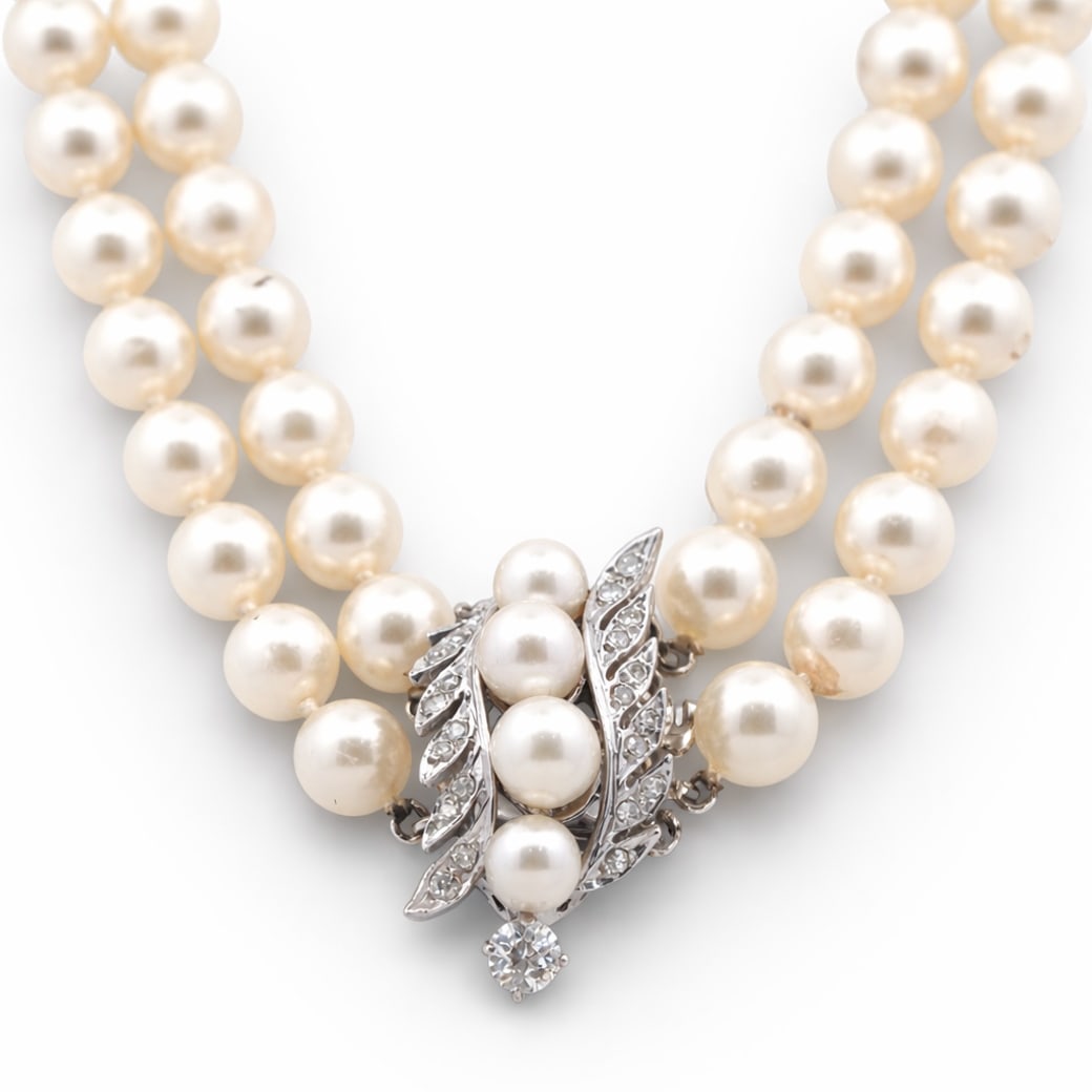 14k Gold Diamond & Pearl Choker Necklace: 14k Gold Diamond & Pearl Choker Necklace Circa 20th Century 14k gold double-strand cultured pearl necklace composed of uniform cream-toned round pearls strung in two continuous strands, terminating