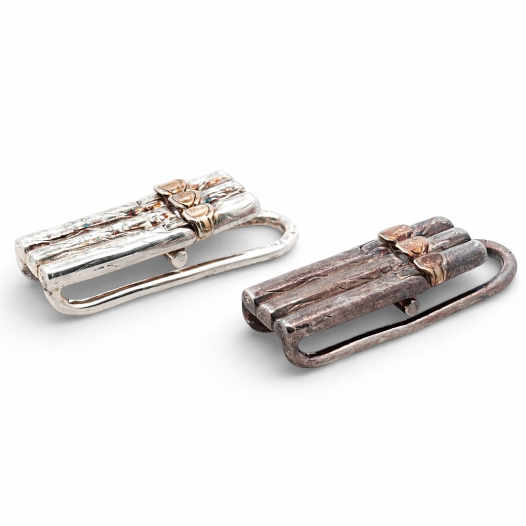 Pair of Gold Mounted Silver Tie Clips: Pair of Gold Mounted Silver Tie Clips 19th Cent. Pair yellow gold mounted silver cigar formed tie clips. Export mark. L: 53" x W: 15mm (Total Weight: 39grams)