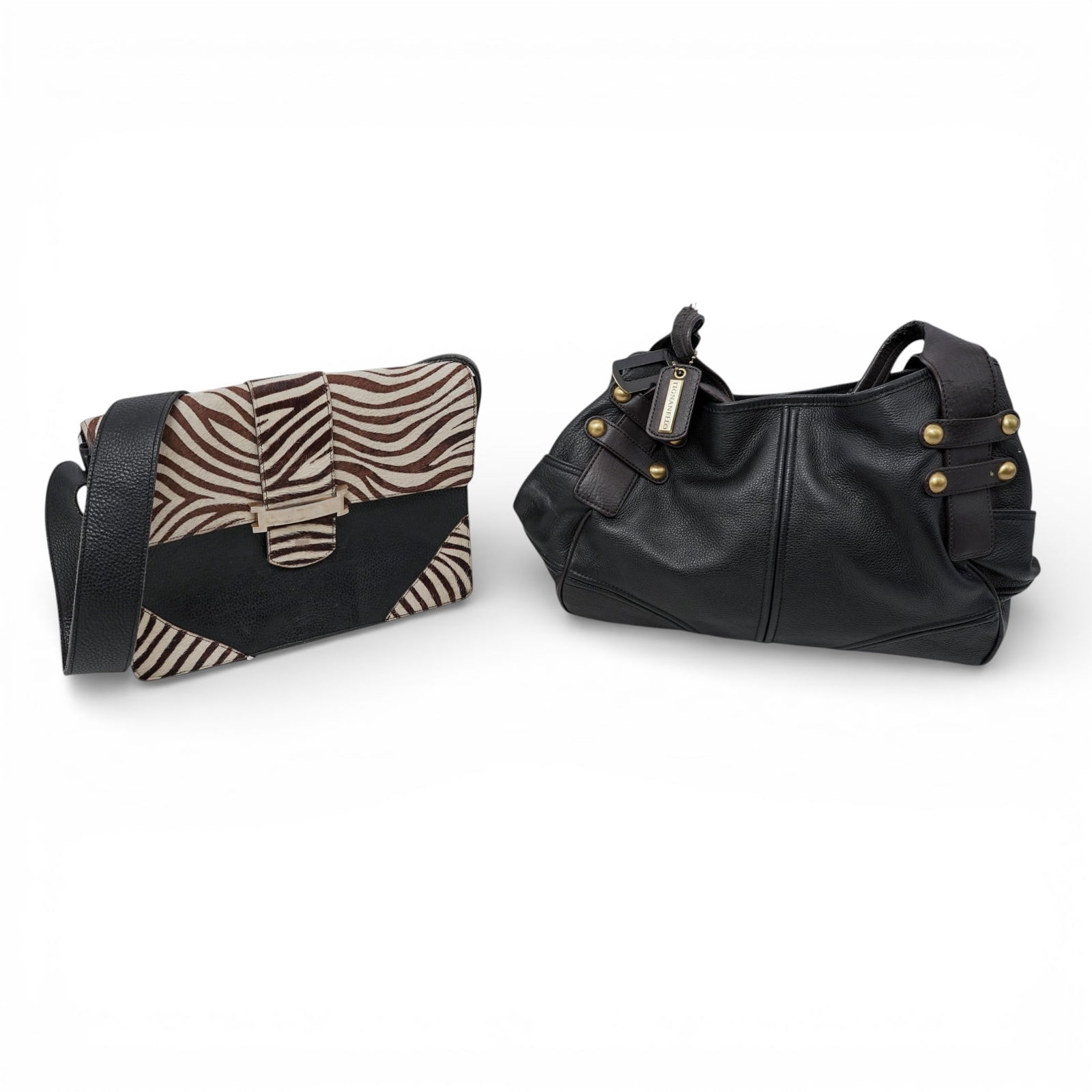 (2 Pcs) Designer Leather Handbags: (2 Pcs) Designer Leather HandbagsCirca 20th CenturyA grouping of two designer leather handbags. The first is a Tignanello black pebbled leather tote with double shoulder straps, brass-tone stud and ri