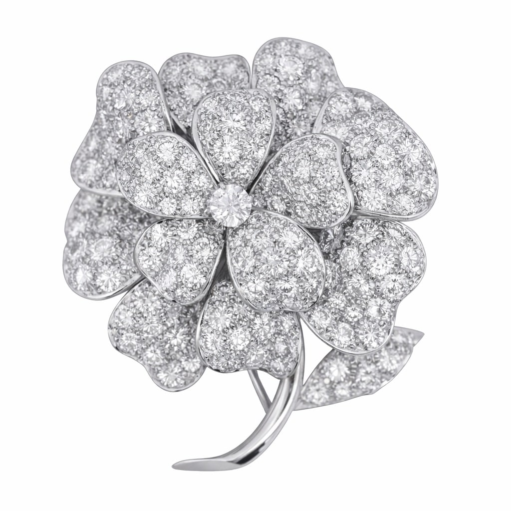 Van Cleef & Arpels Platinum & Diamond Flower Brooch: Van Cleef & Arpels Platinum & Diamond Flower Brooch1990s, FrenchPlatinum flower-form brooch by Van Cleef & Arpels, designed as layered, overlapping three dimensional petals entirely graduating pavé-s