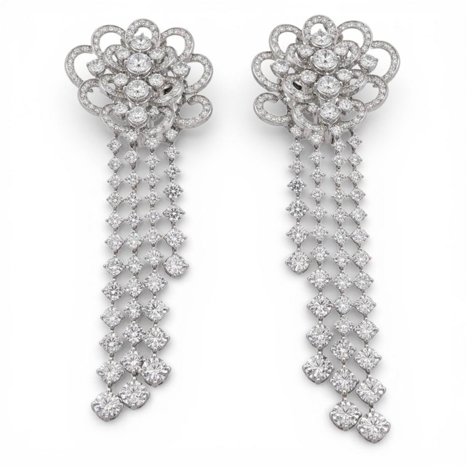 RCM Gioielli Italian 18K Gold & Diamond Drop Earrings: RCM Gioielli Italian 18K Gold & Diamond Drop Earrings1980s-1990s, ItalianPair of Italian 18k white gold diamond drop earrings designed by RCM Gioielli with openwork floral cluster tops pavé-set with