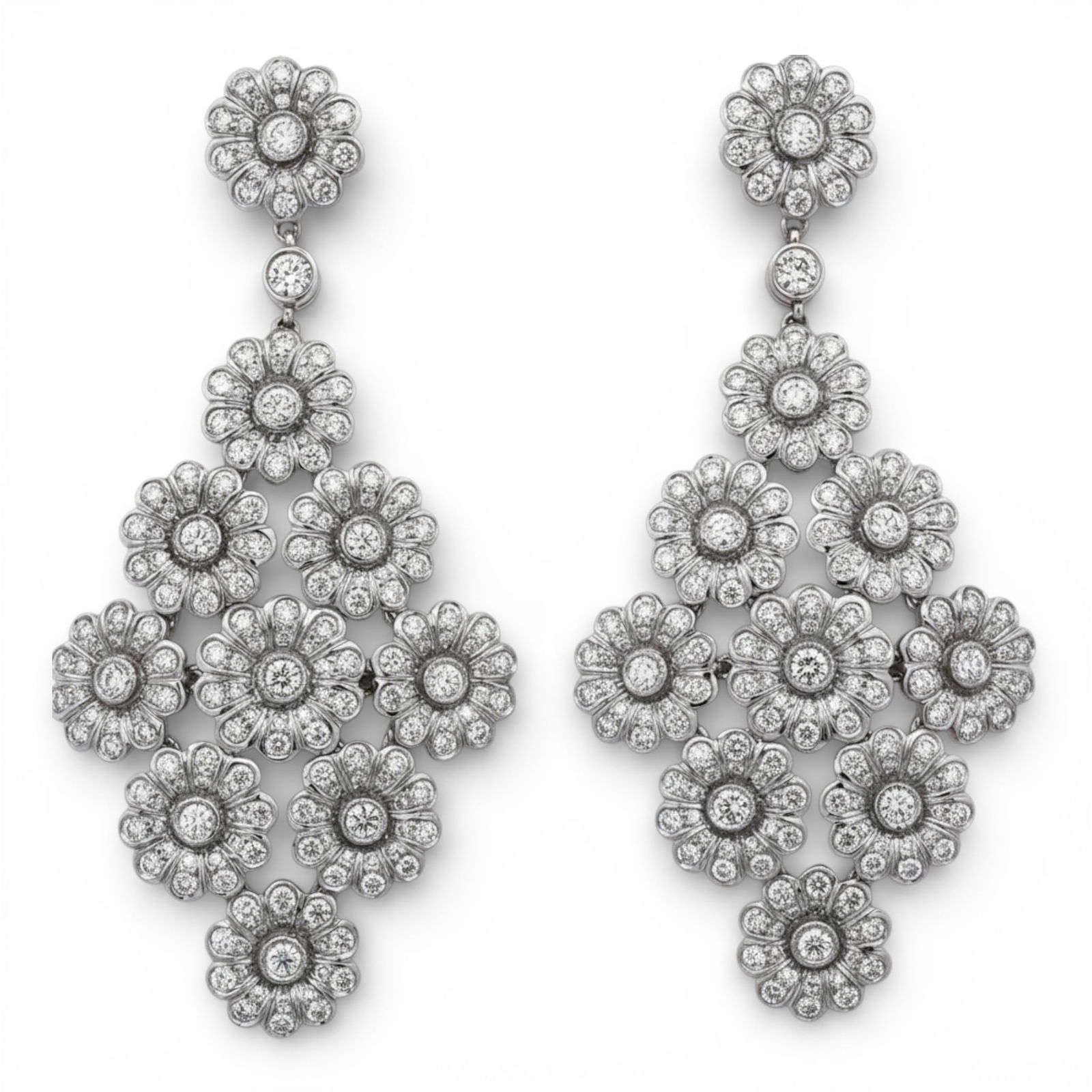 Tiffany & Co. Rose Collection Platinum & Diamond Drop Earrings: Tiffany & Co. Rose Collection Platinum & Diamond Drop Earrings20th Century, USAPlatinum and diamond drop earrings from the Tiffany & Co. Rose Collection, composed of cascading pavé-set floral rosette