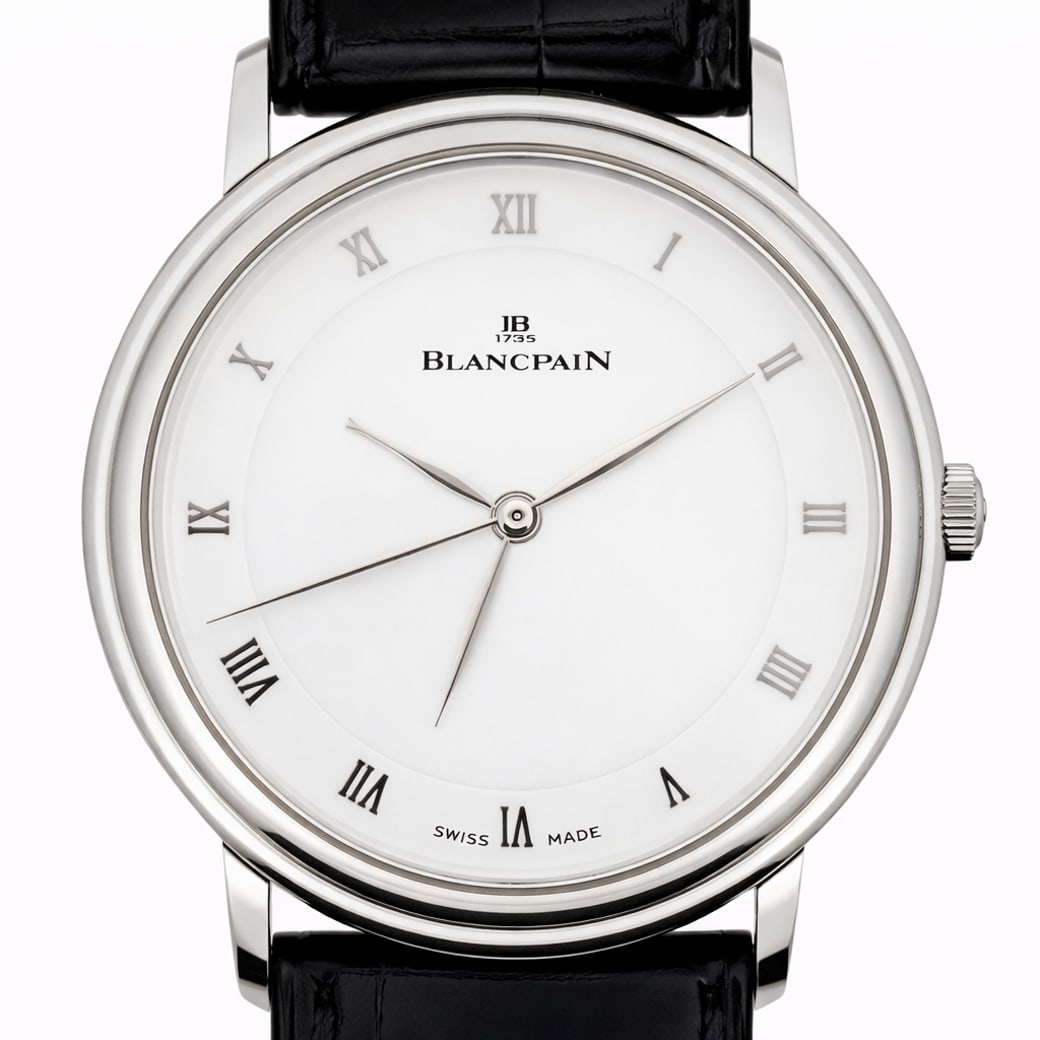 Blancpain Villeret Platinum LE Watch: Blancpain Villeret Platinum LE WatchCirca 1990s, SwissElegant Limited Edition Blancpain Villeret Ultra-Slim dress wristwatch in platinum, featuring a clean white dial with Roman numerals and two-hand