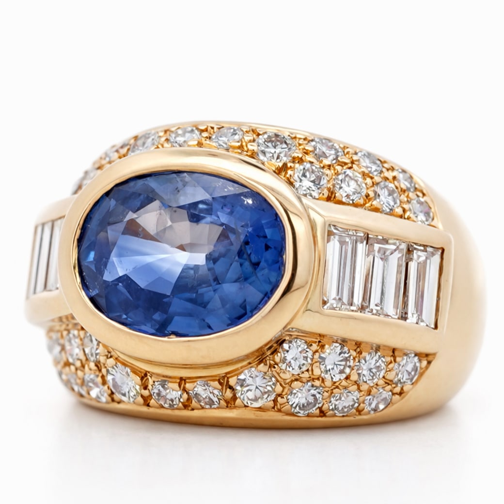 Vintage French 18k Gold Sapphire & Diamond Ring: Vintage French 18k Gold Sapphire & Diamond RingCirca 1940s-1950s, FrenchAntique French 18k yellow gold ring centered with a bezel-set oval natural sapphire measuring 11.02 × 8.22 × 4.86 mm, weighing