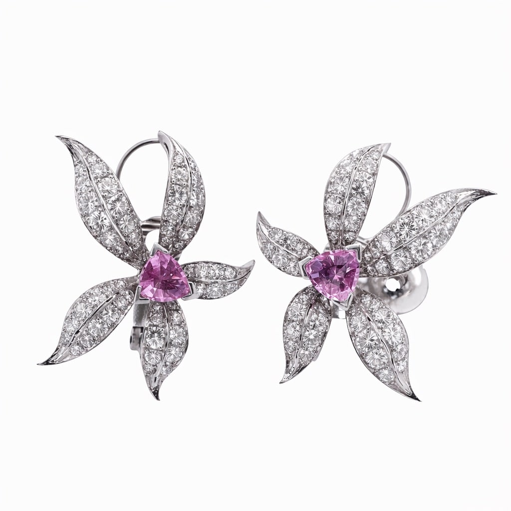 18k Gold Diamond & Pink Kunzite Flower Earrings Signed: 18k Gold Diamond & Pink Kunzite Flower Earrings SignedCirca: Late 20th Century, Italy.Floral-form earrings made in 18k white gold, each centered by a triangular mixed-cut pink kunzite, surrounded by p