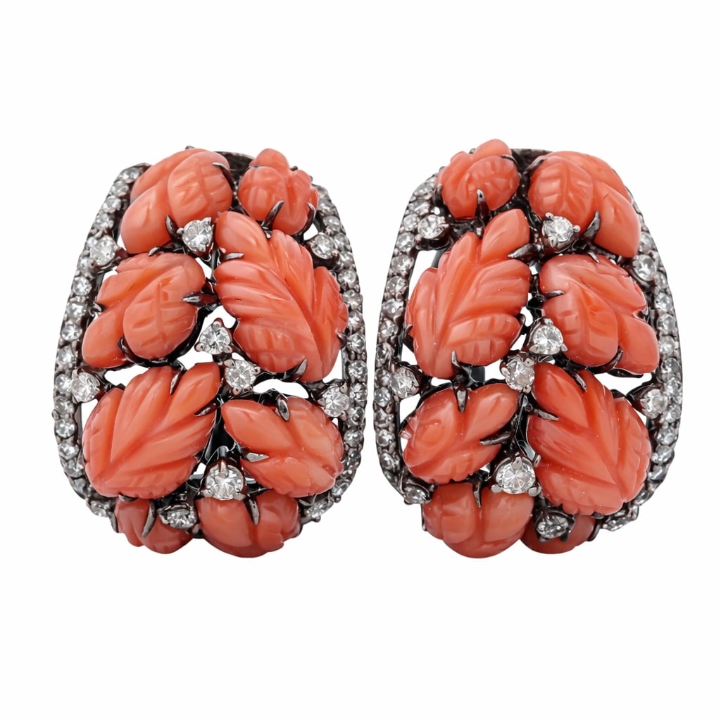 Vintage 18k Gold Pink Coral & Diamond Earrings: Vintage 18k Gold Pink Coral & Diamond Earrings1960s, ItalianVintage pair of earrings in 18k yellow gold, designed as domed clusters of carved pink coral leaves arranged in layered relief, accented thr