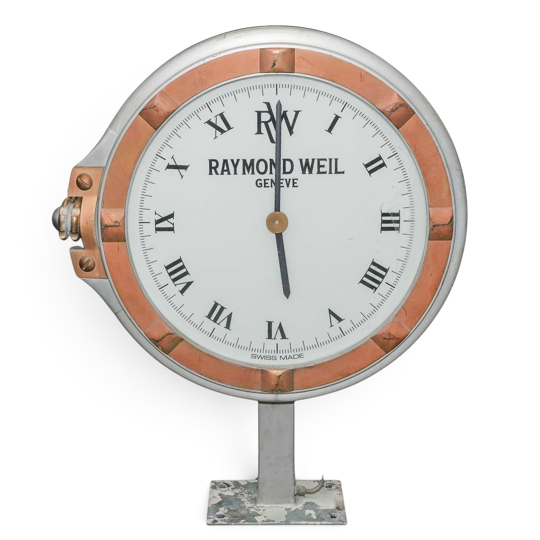 Vintage Raymond Weil Genève Display Clock: Vintage Raymond Weil Genève Display Clock Late 20th Century, Switzerland A large store display clock with roman numeral hour markers and central hands, marked “RAYMOND WEIL GENEVE,” within a 