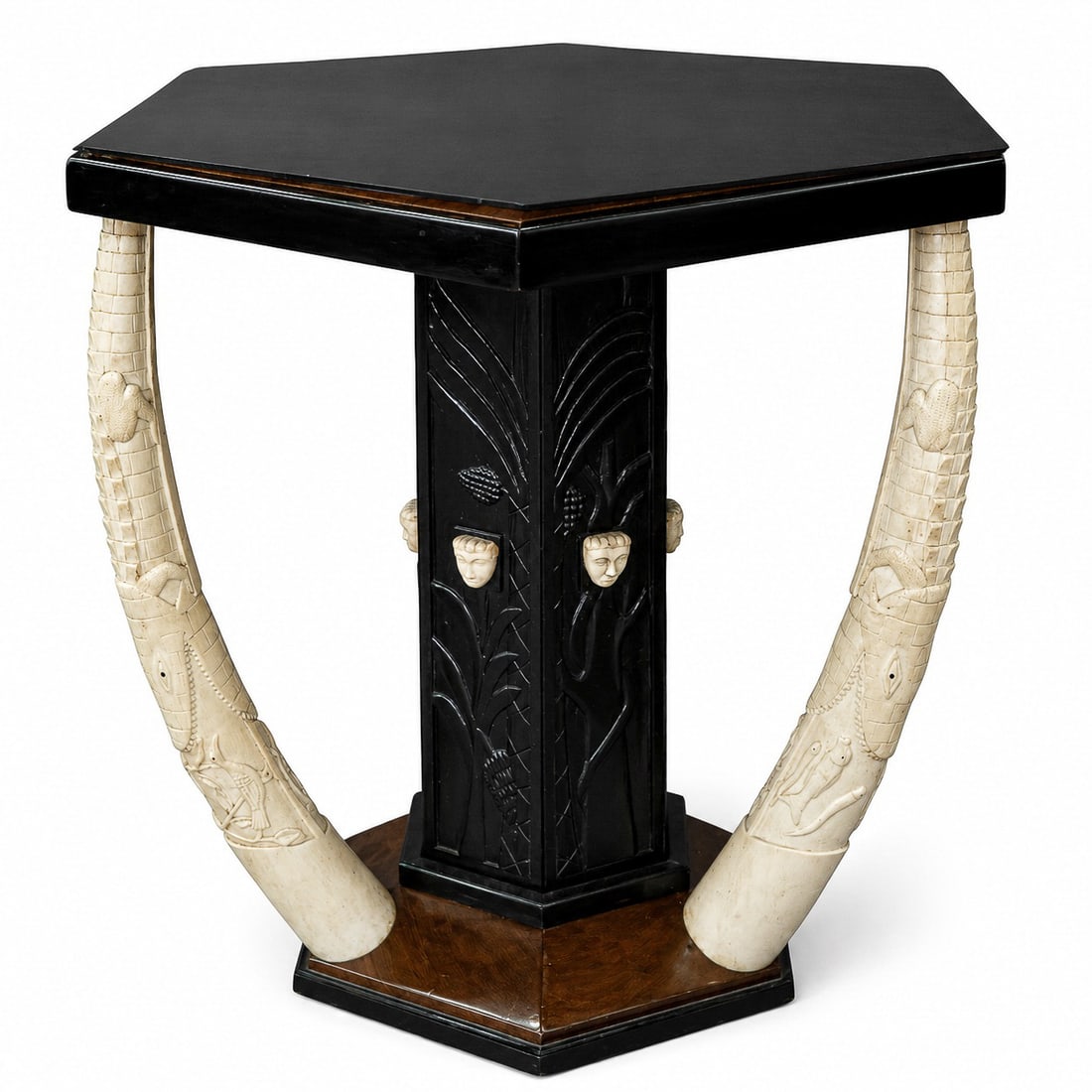 Art Deco Ebonized Wood & Bone Tusk Table: Art Deco Ebonized Wood & Bone Tusk Table Early 20th century An unusual and dramatic Art Deco pedestal accent table. The octagonal top features a fitted dark-tinted mirror insert set within an ebonized
