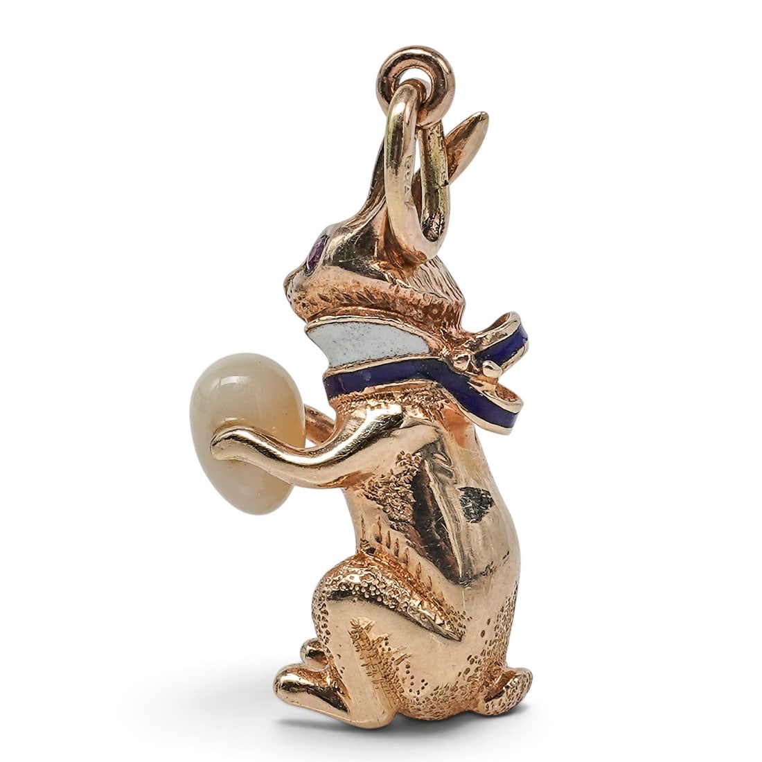 Feodor Afanasiev Russian 14k Gold Ruby and Enamel Rabbit with Egg Charm Pendant: Feodor Afanasiev Russian 14k Gold Ruby and Enamel Rabbit with Egg Charm Pendant Early 20th Cent., Russian Russian 14k gold ruby and enamel bunny pendant by Feodor Afanasiev, featuring a finely modeled