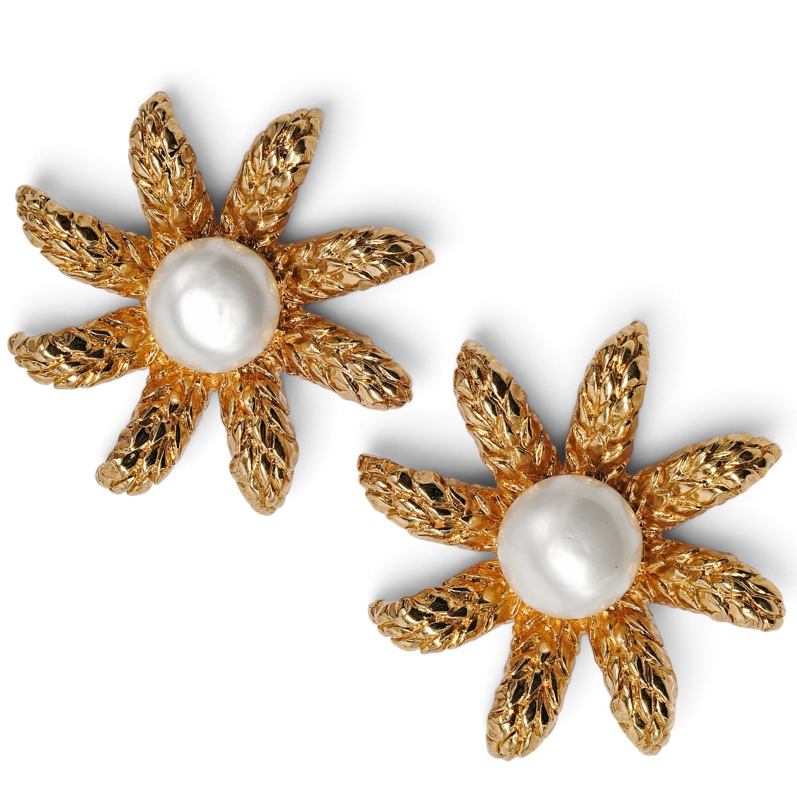 Chanel Clip-On Flower Earrings: Chanel Clip-On Flower Earrings 1994. French Vintage Chanel gold-tone flower earrings featuring textured petals centered by large faux pearls. Hallmarked "94 CC A." Made in France. Diameter: 2"