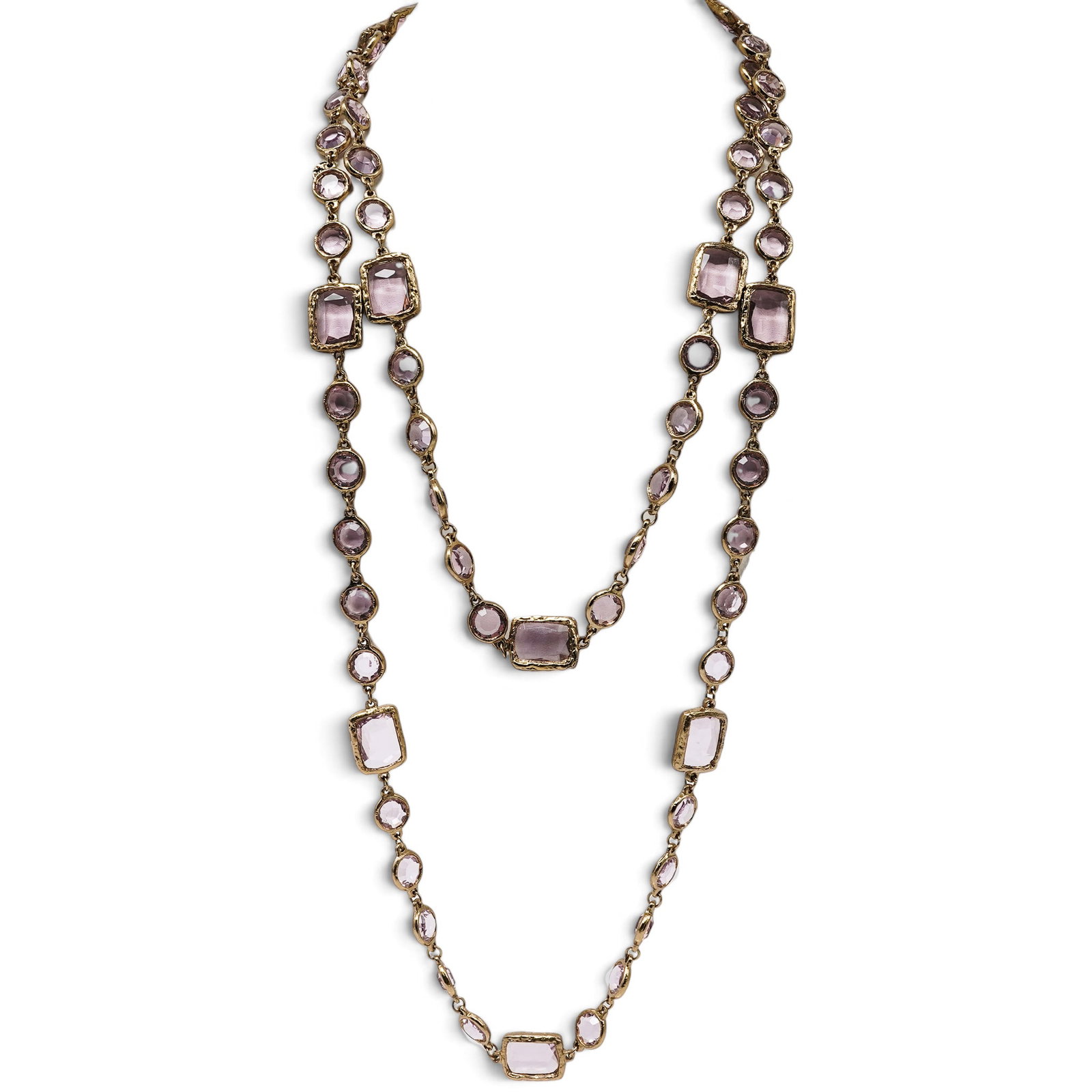 Chanel Gold-Tone Amethyst-Colored Crystal Necklace: Chanel Gold-Tone Amethyst-Colored Crystal Necklace Circa 1981. French Vintage Chanel gold-tone long station necklace featuring faceted oval and rectangular amethyst-colored crystals in textured bezel 