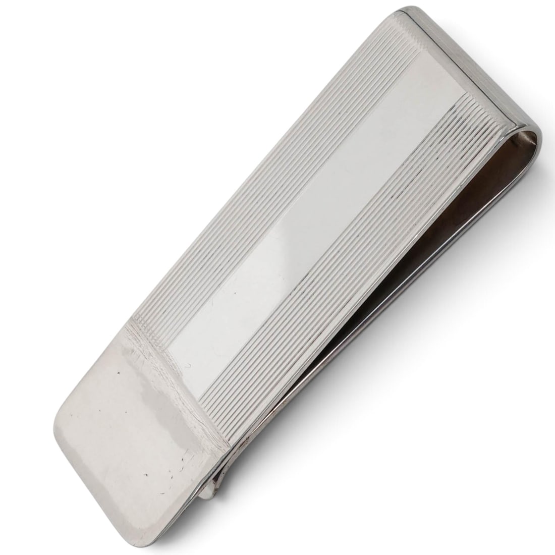 Tiffany & Co. Sterling Silver Money Clip: Tiffany & Co. Sterling Silver Money Clip 1990s, USA Tiffany & Co. sterling silver money clip with polished rectangular form, ribbed linear detailing, rounded folded end, and engraved date "2.8.97". St