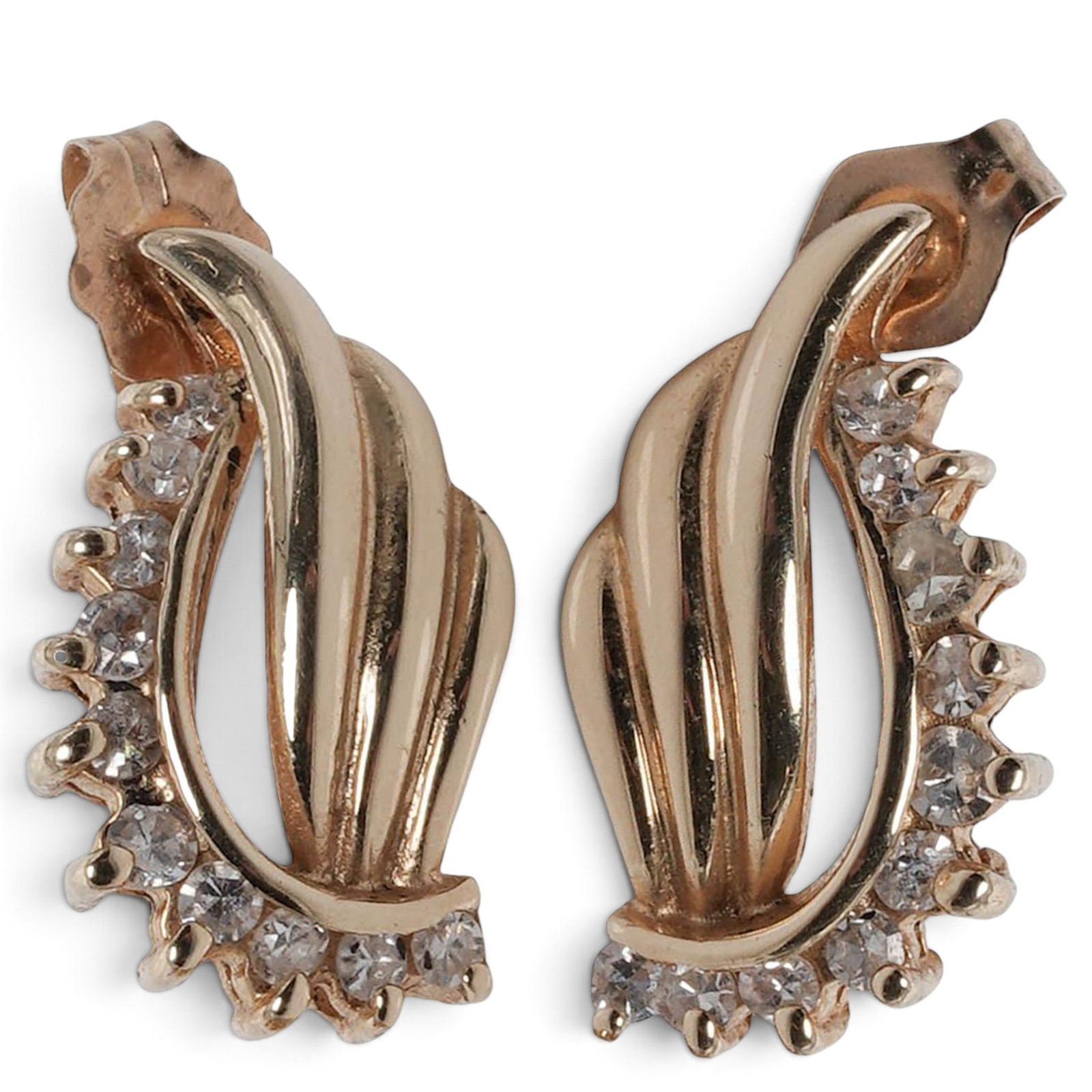 14k Gold & Diamond Wave Earrings: 14k Gold & Diamond Wave Earrings Late 20th Century Pair of 14k yellow gold earrings in sculptural wave-form design with polished folded panels, openwork backs, prong-set round diamonds, and post backs