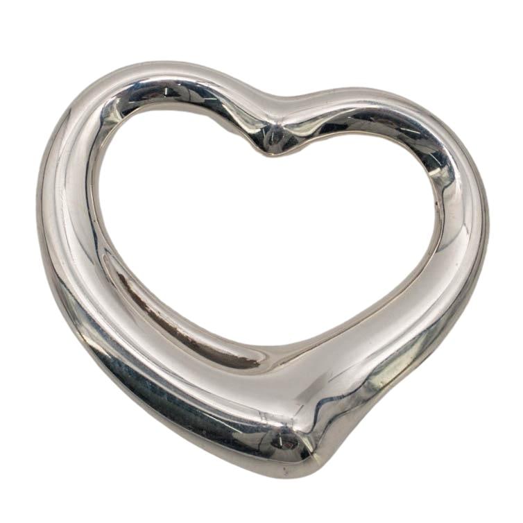 Elsa Peretti for Tiffany & Co. Sterling Silver Open Heart Pendant: Elsa Peretti for Tiffany & Co. Sterling Silver Open Heart Pendant Late 20th/21st century, Spanish Elsa Peretti for Tiffany & Co. sterling silver Open Heart pendant in polished sculptural heart-form de