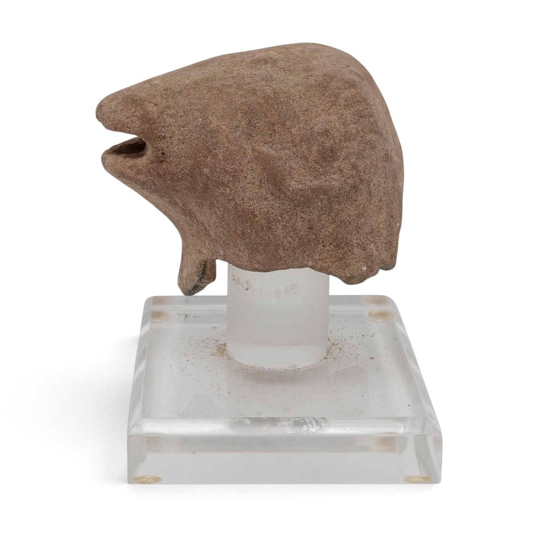 Eastern Mediterranean Ram Head Rhyton Spout Fragment: Eastern Mediterranean Ram Head Rhyton Spout Fragment Approx. Archaic to Classical Horizon, Eastern Mediterranean Hand-carved from volcanic silicate tuff with a siliceous, this fragment represents the 